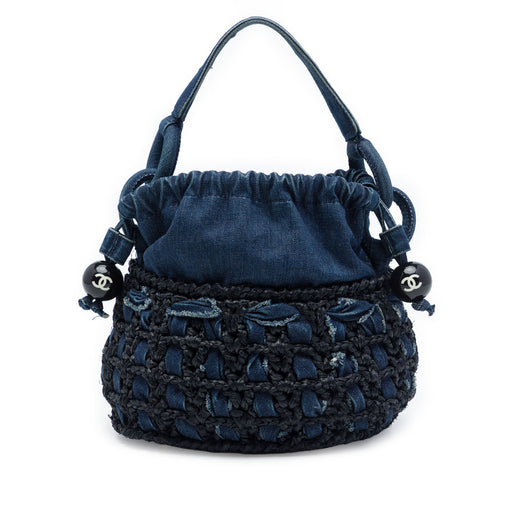 CC Woven Denim and Raffia Drawstring Bucket Bag - Image 1