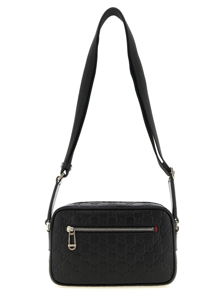 Gucci Embossed Gg Monogram Crossbody Bag — Black
