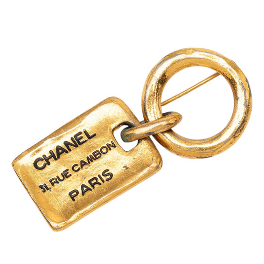 Gold Plated Rue Cambon Tag Brooch - Image 1