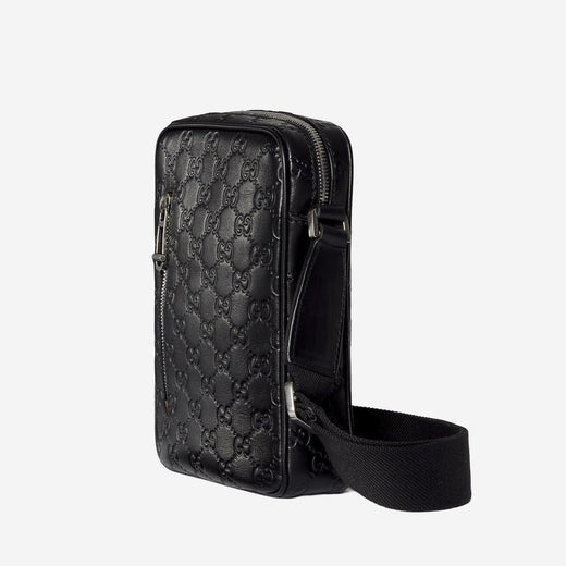Gucci Gg Embossed Leather Crossbody Bag — Black