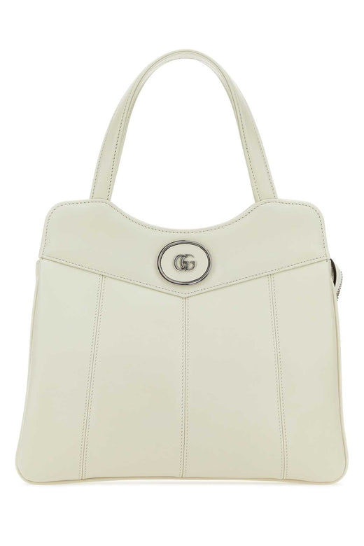 Gucci Leather Gg Medallion Top Handle Bag — Beige