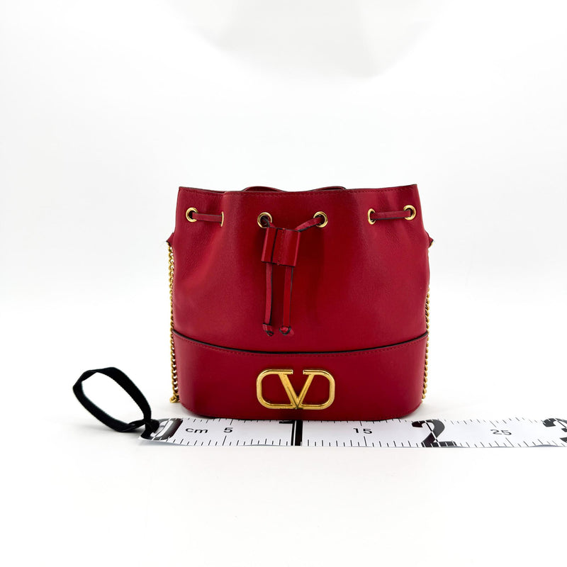 Valentino Garavani Vlogo Drawstring Bucket Leather Gold Bag
