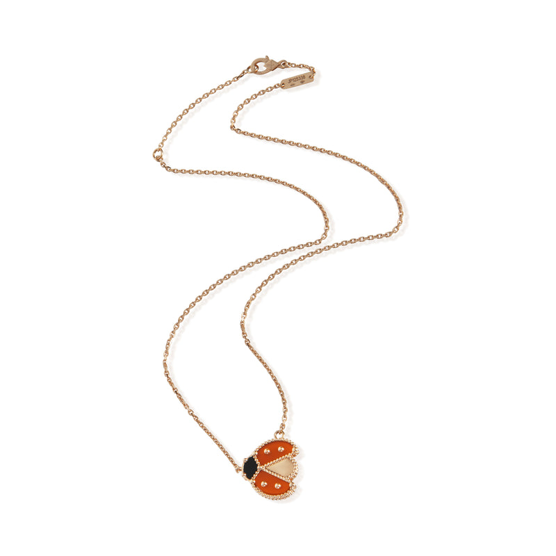 Van Cleef & Arpels Rose Gold Carnelian And Onyx Lucky Spring Pendant 18k