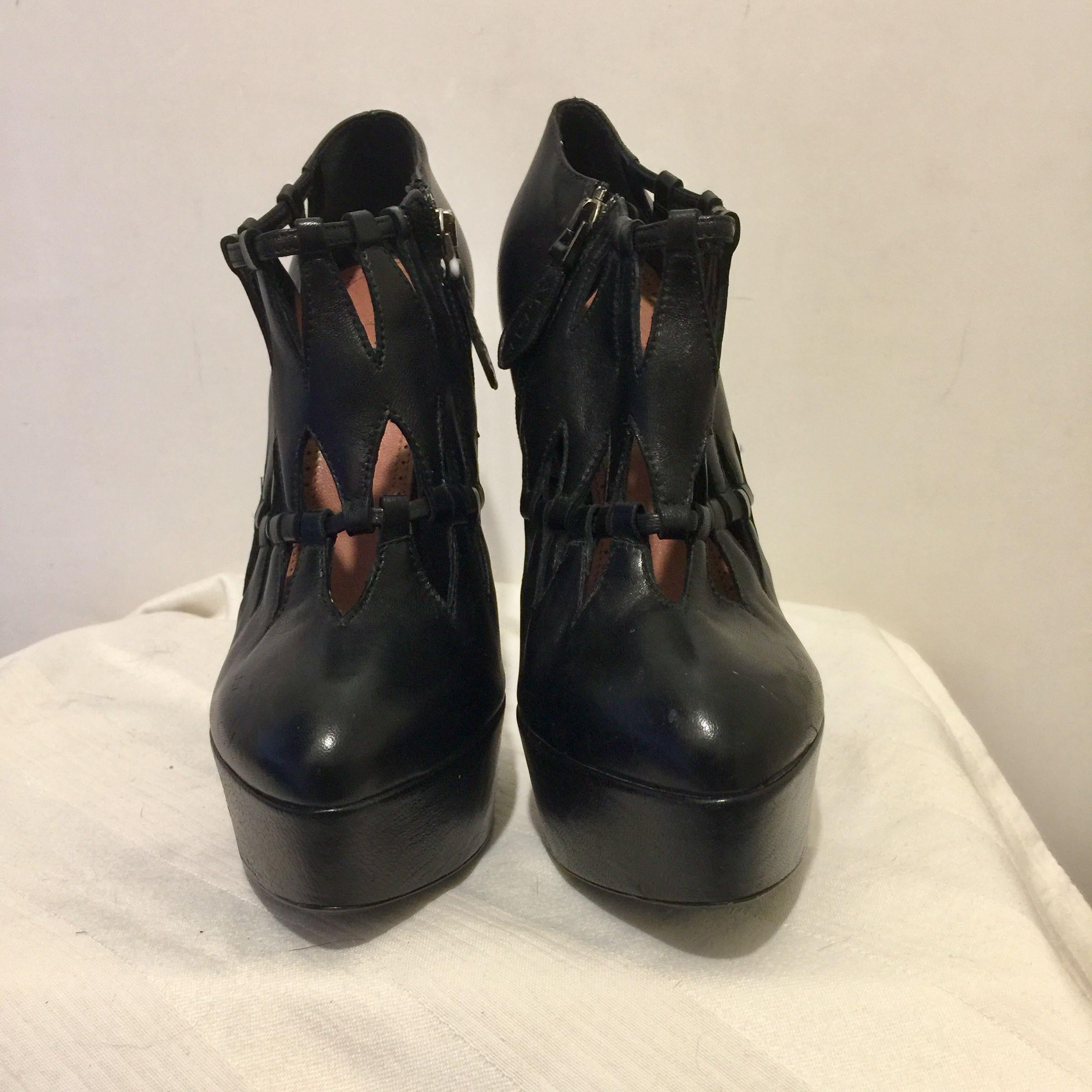 Black leather cut-out platform heeled booties