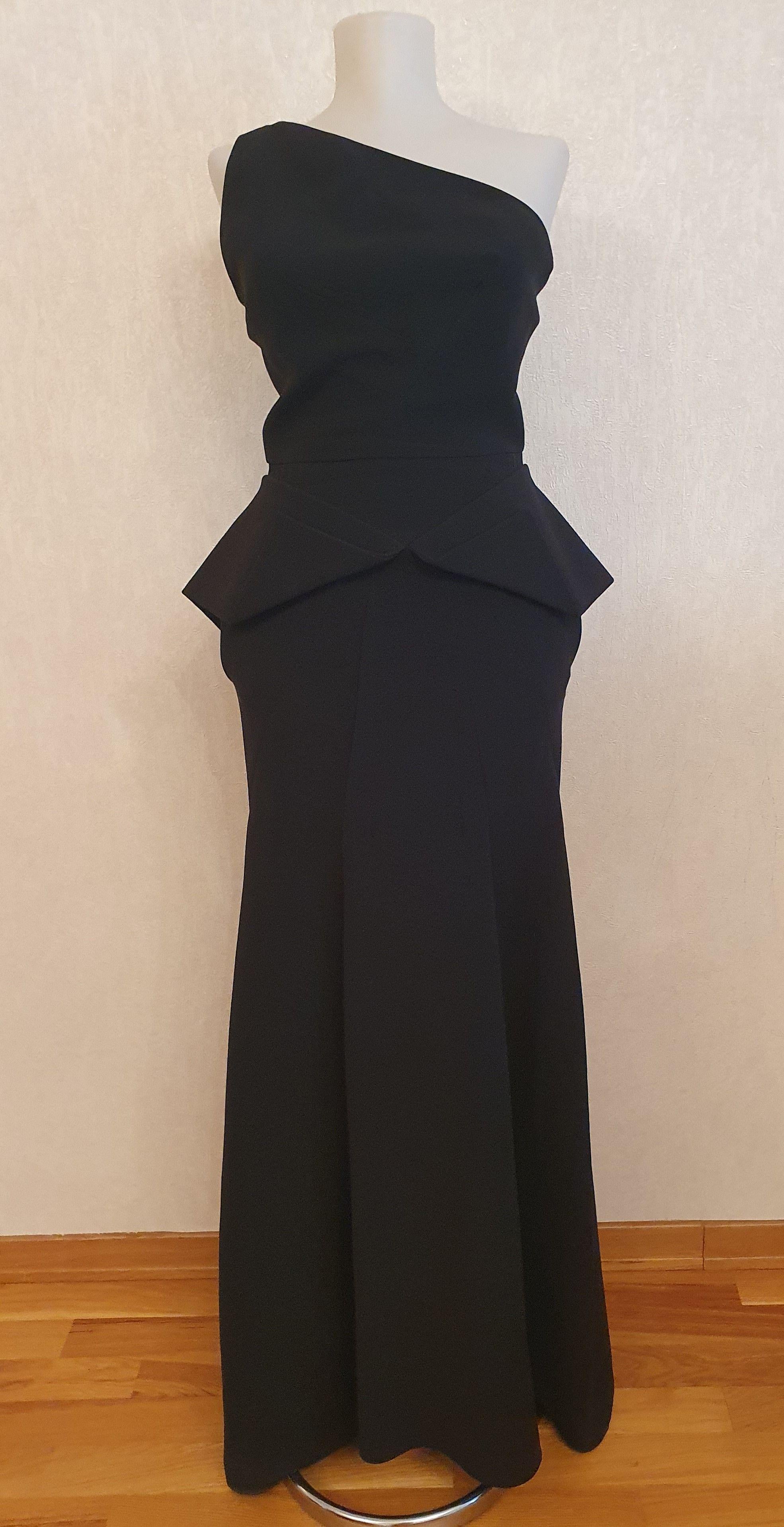 Black wool crepe one shoulder peplum gown