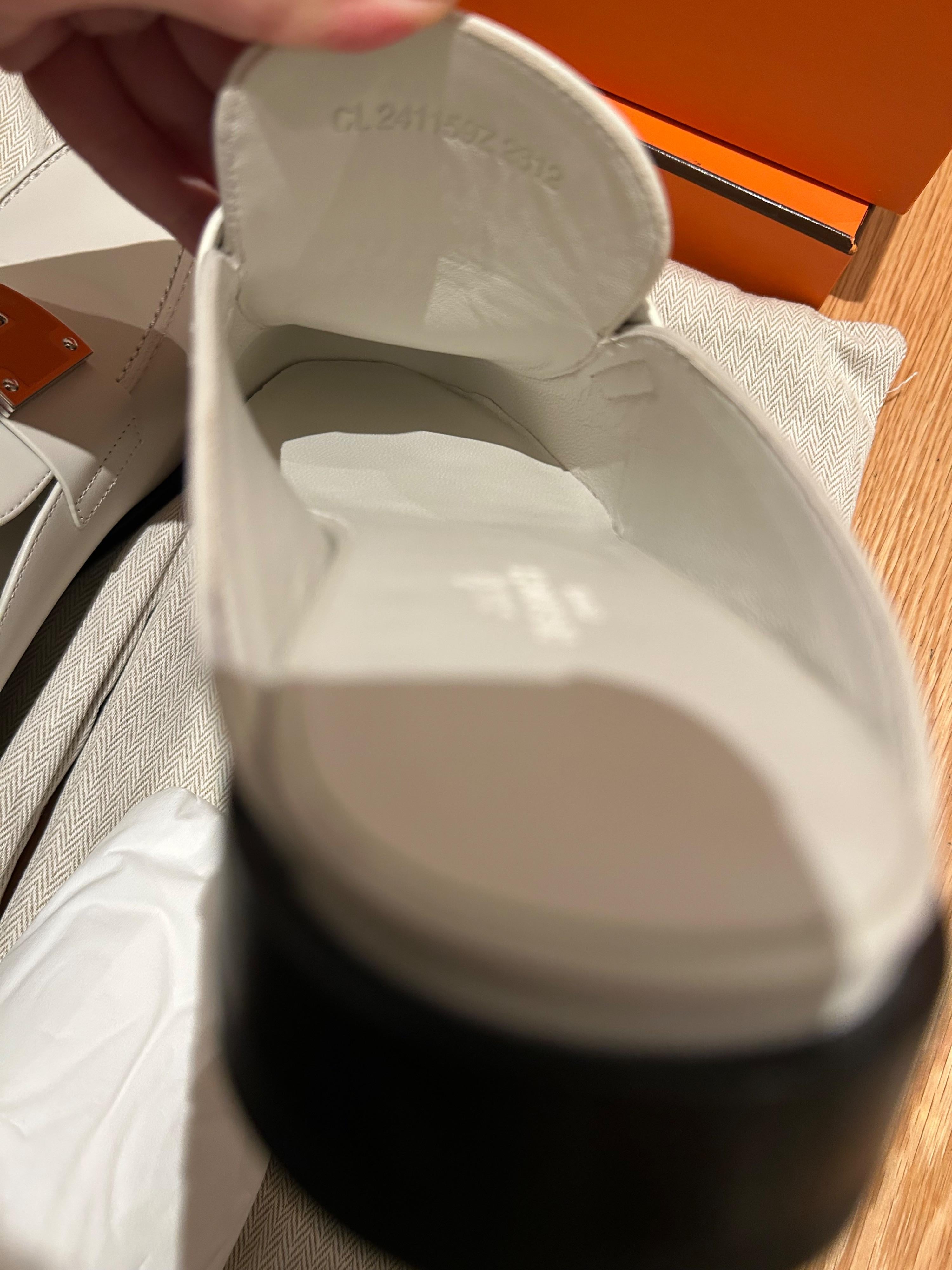 Hermes White Kelly Buckle Mules
