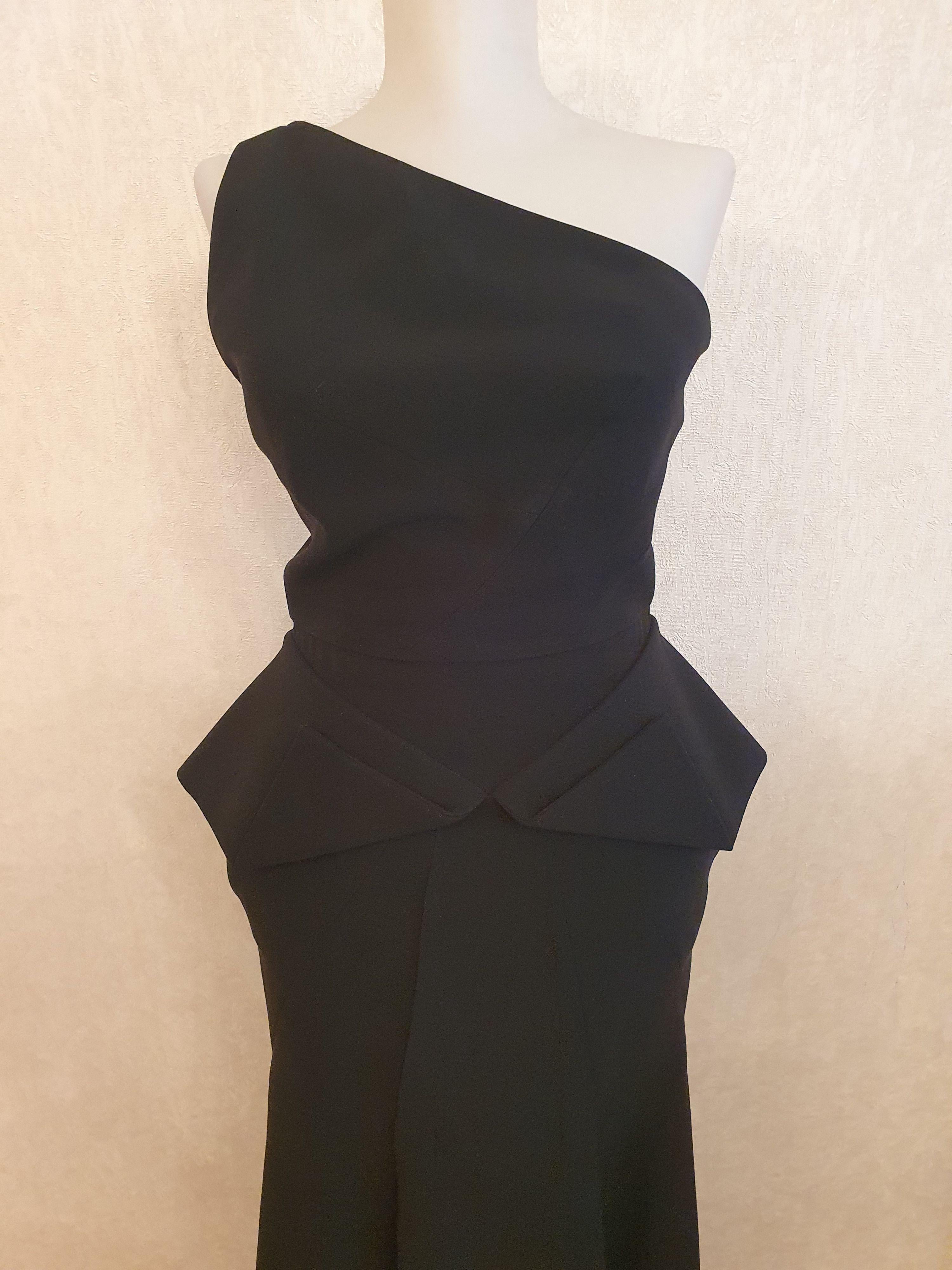 Black wool crepe one shoulder peplum gown