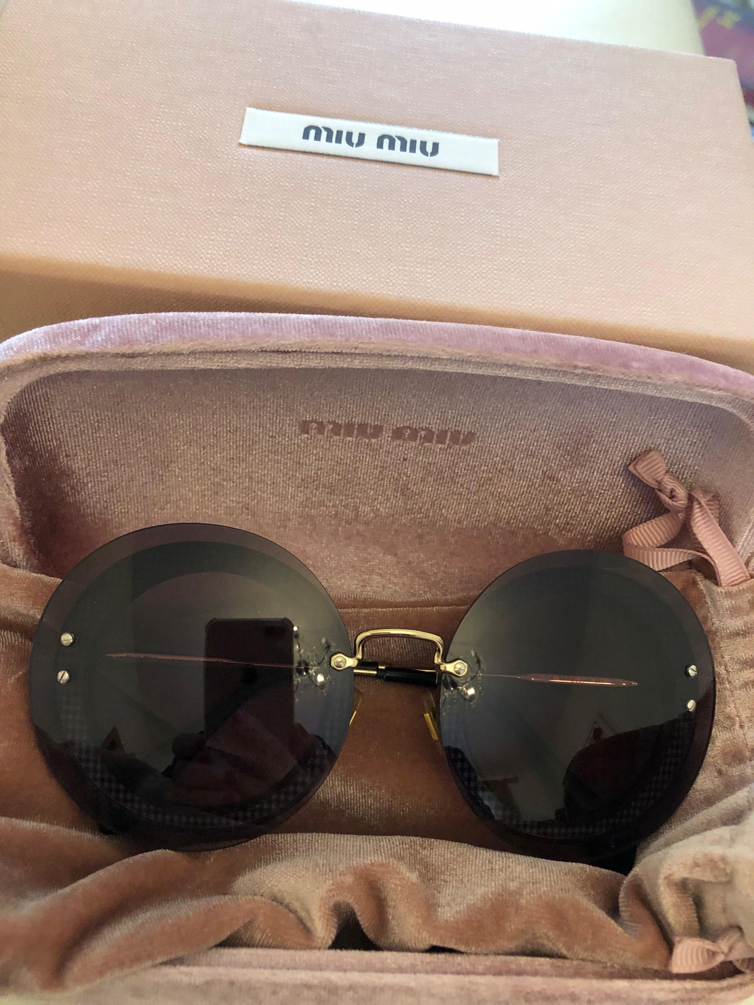 Miu Miu Black Round Sunglasses