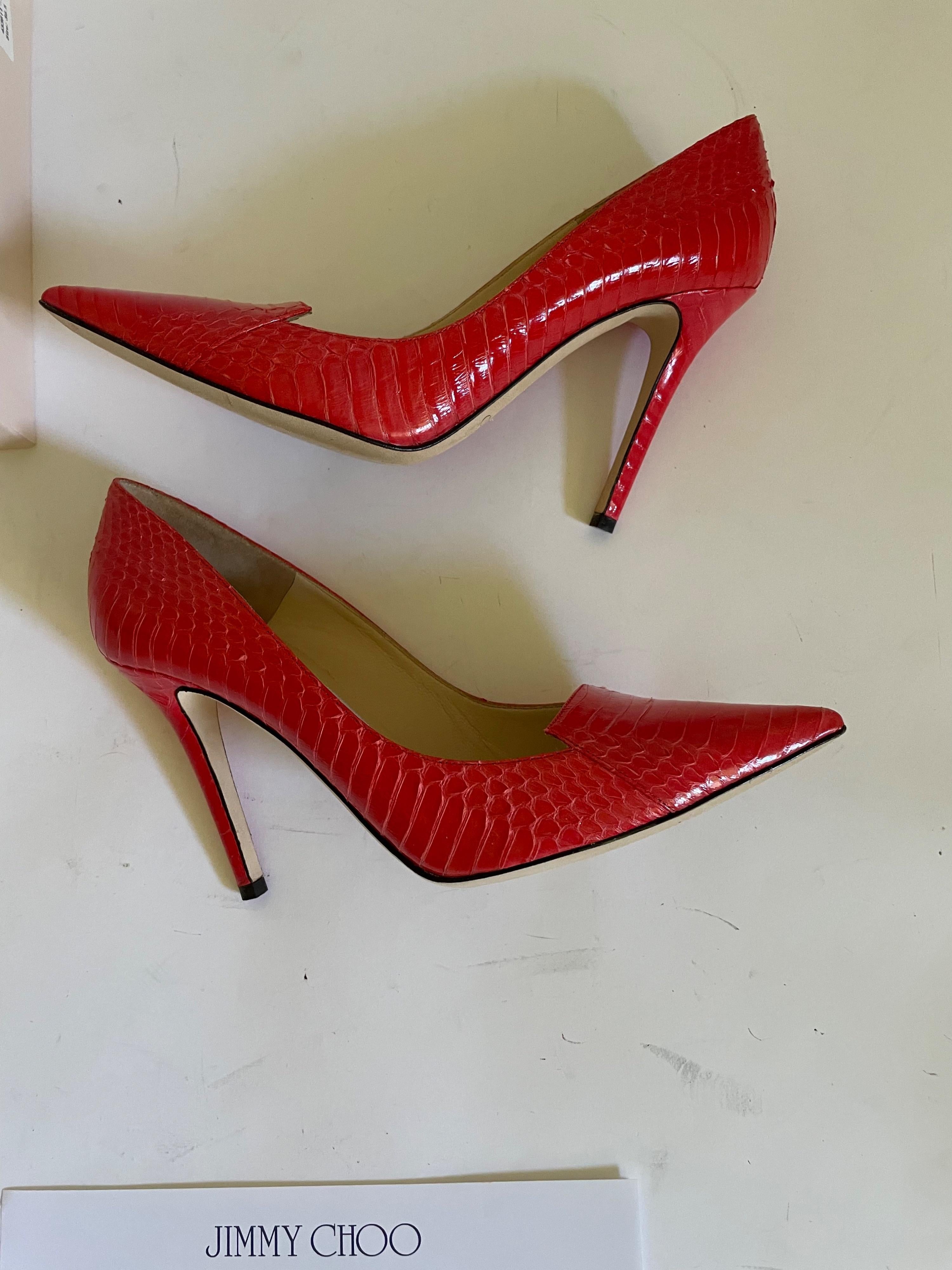 Red snakeskin Avril heeled pumps