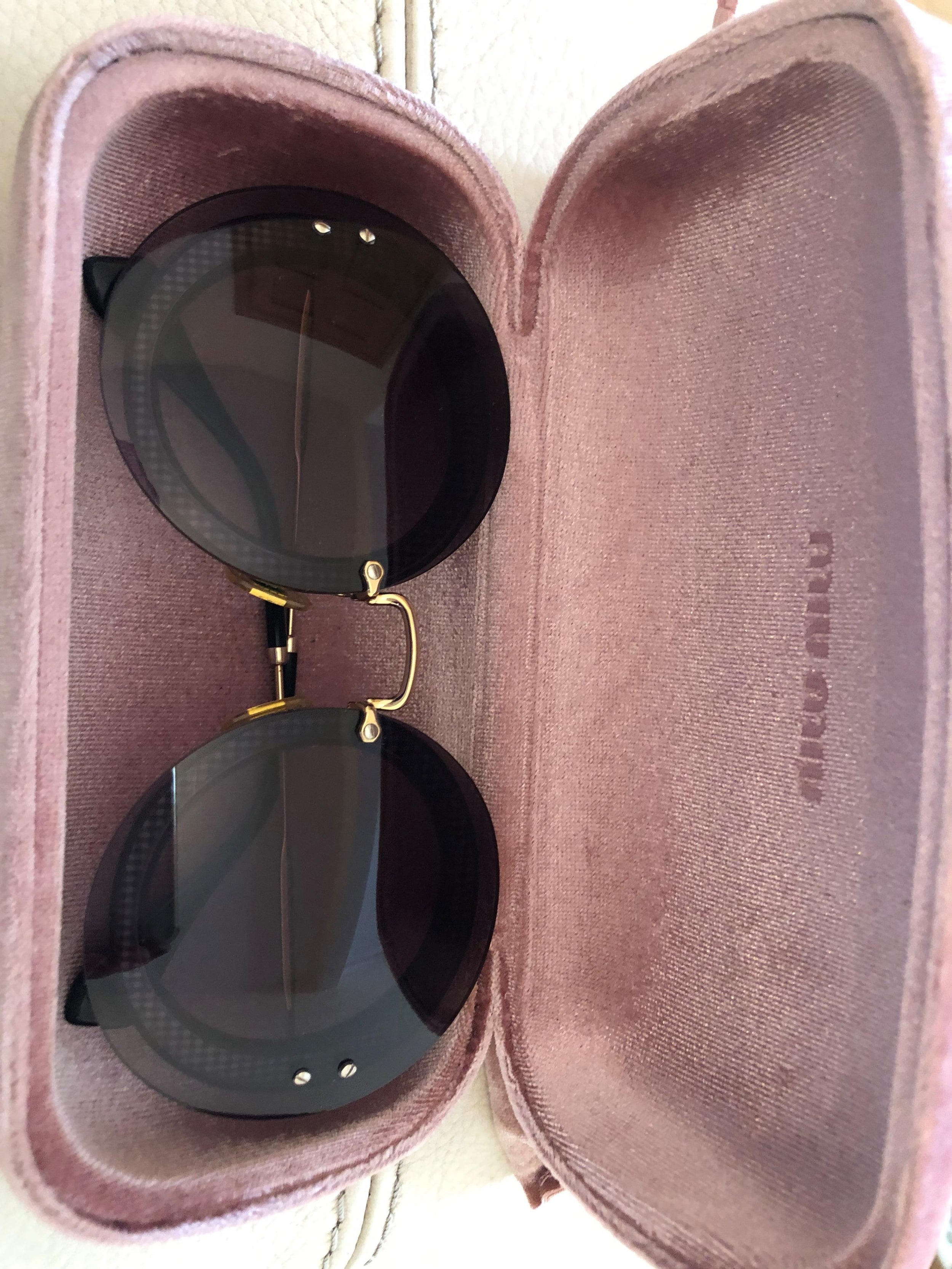 Miu Miu Black Round Sunglasses
