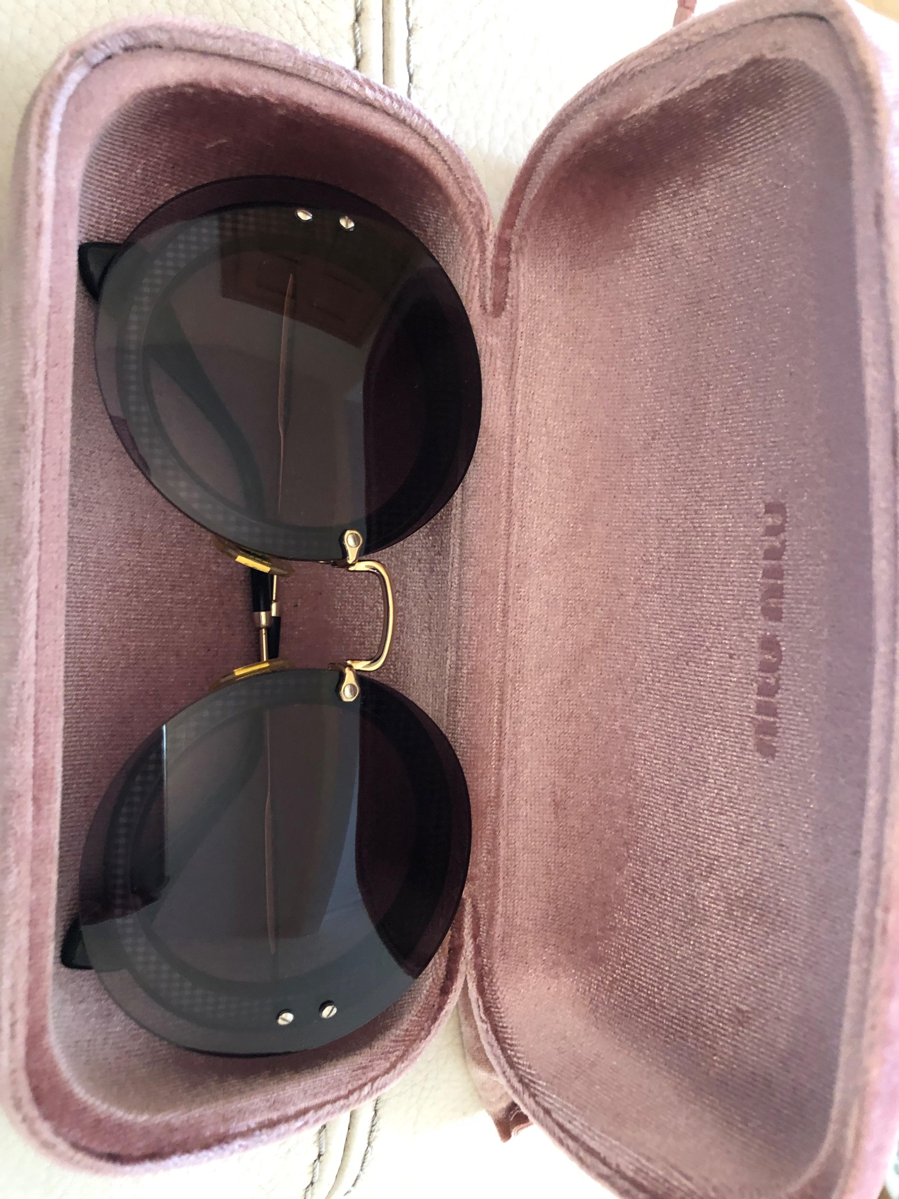 Miu Miu Black Round Sunglasses