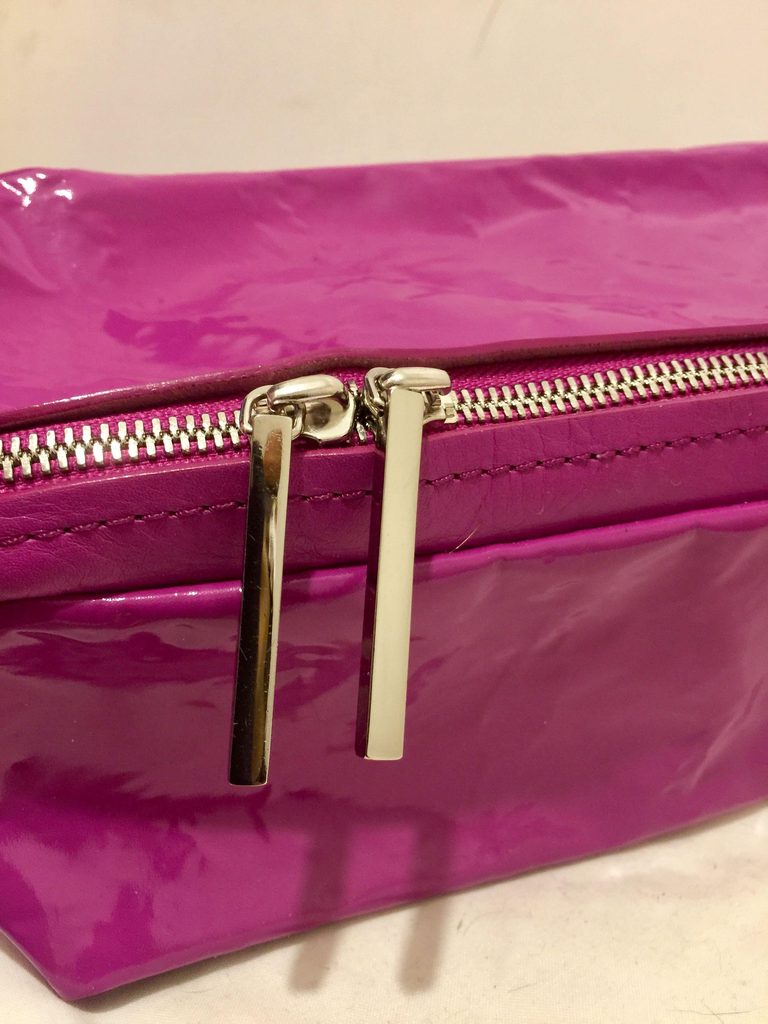 Fuchsia vinyl & leather clutch bag