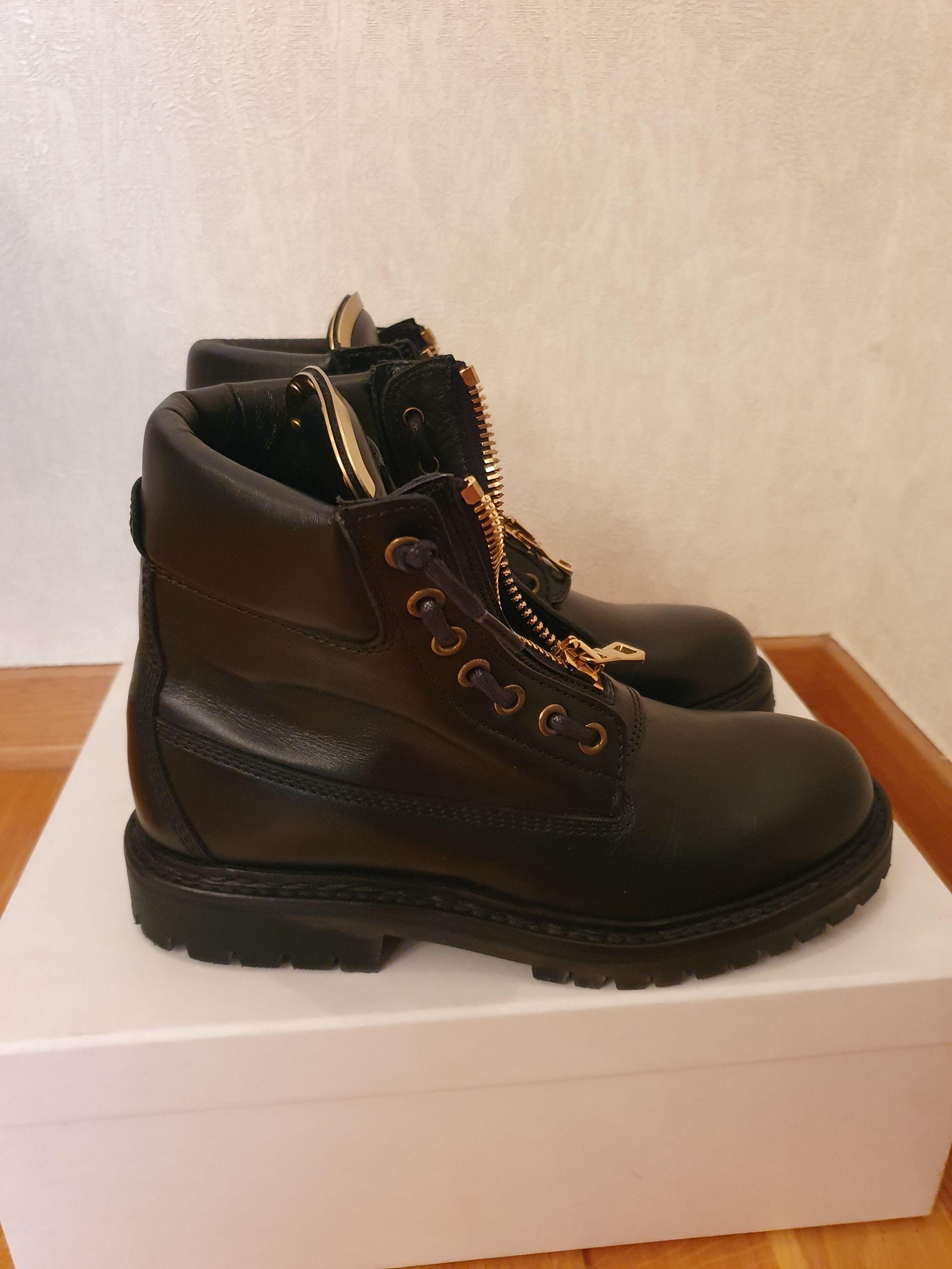 Black leather zip combat boots