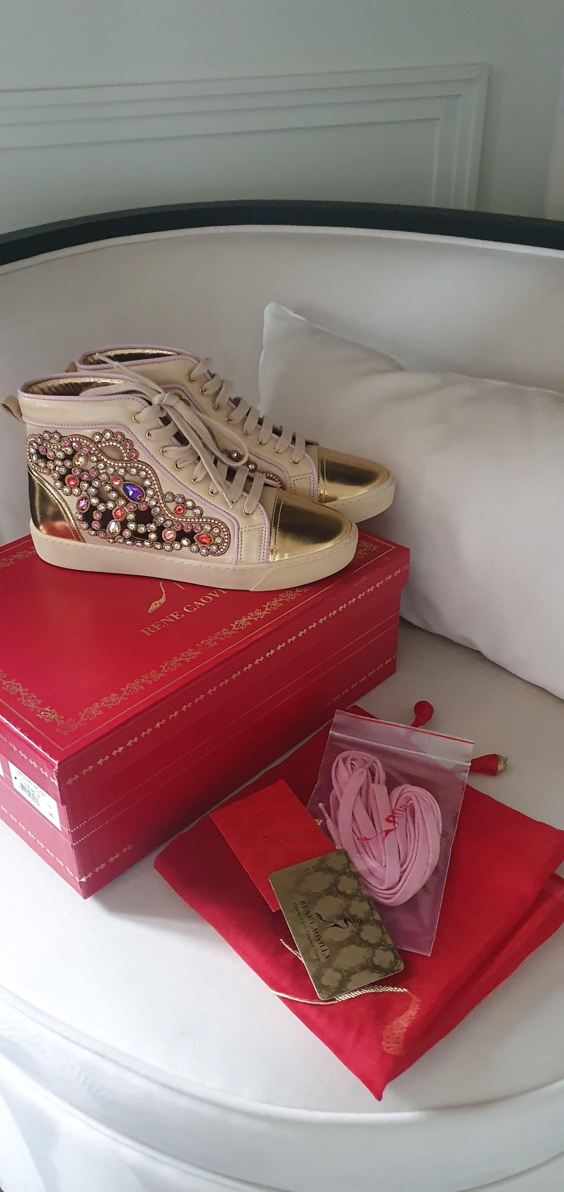 Metallic gold leather & crystal cut-out trainers