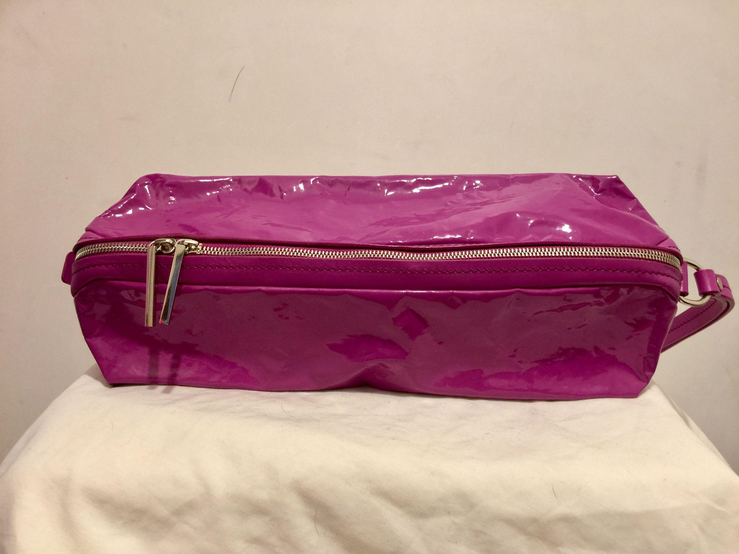 Fuchsia vinyl & leather clutch bag