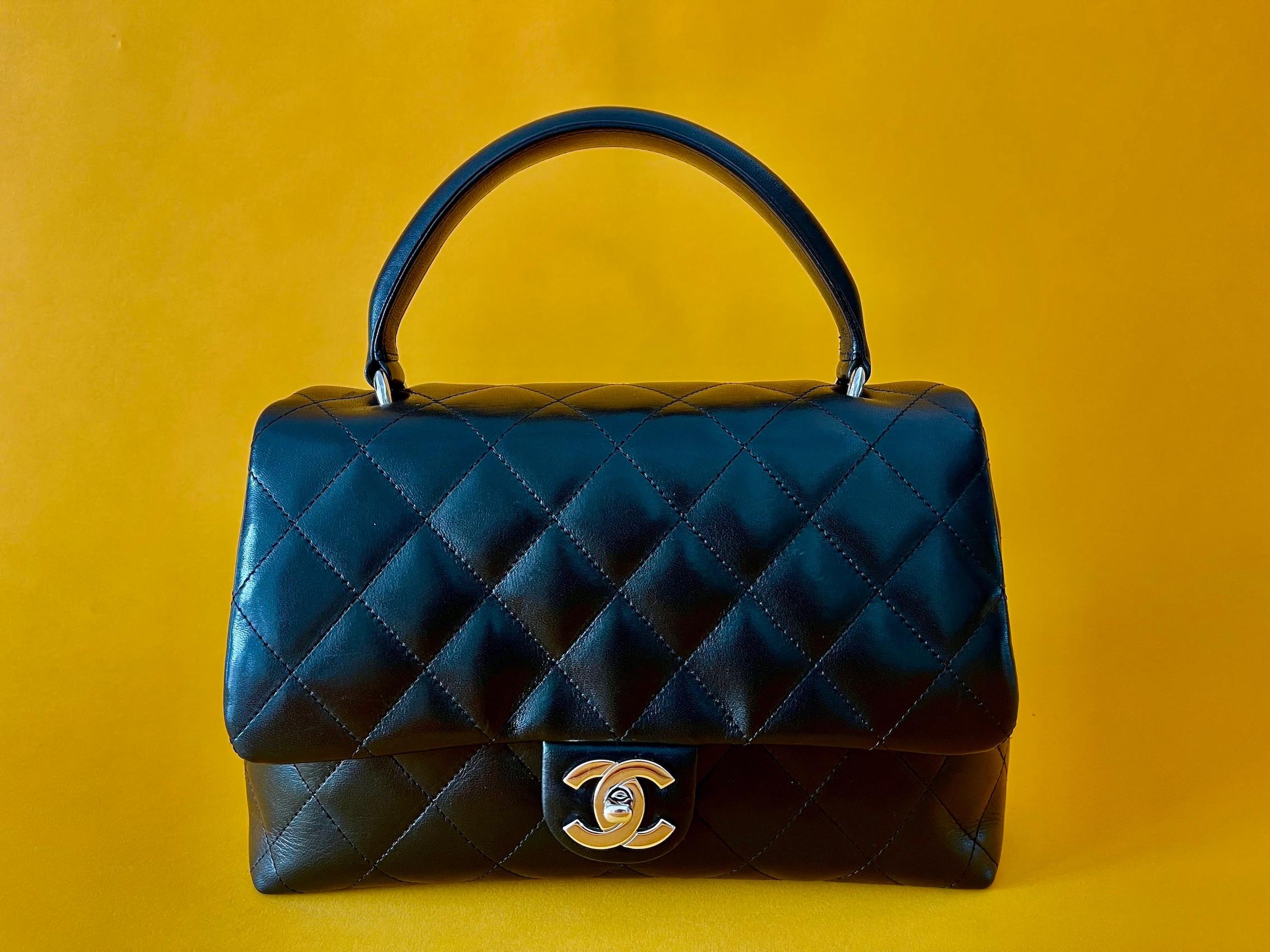 Vintage black leather quilted bag