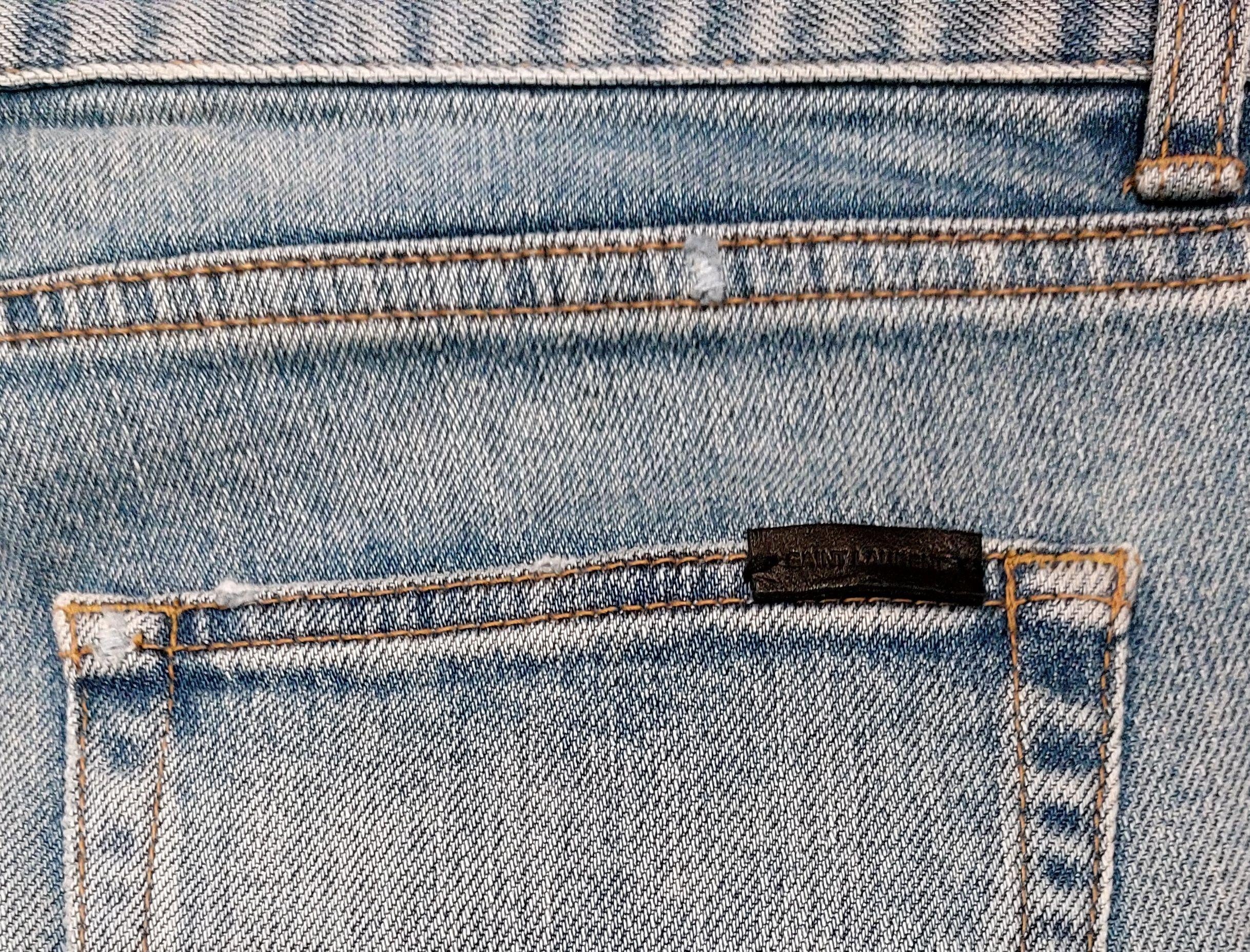 Saint Laurent Washed Denim Distressed Skinny Jeans