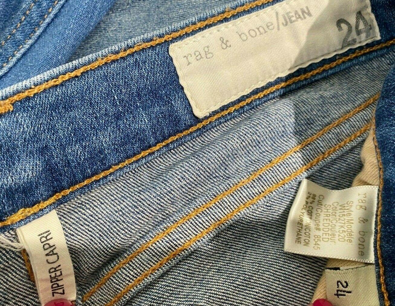Mid-wash distressed denim Zipper Capri jeans