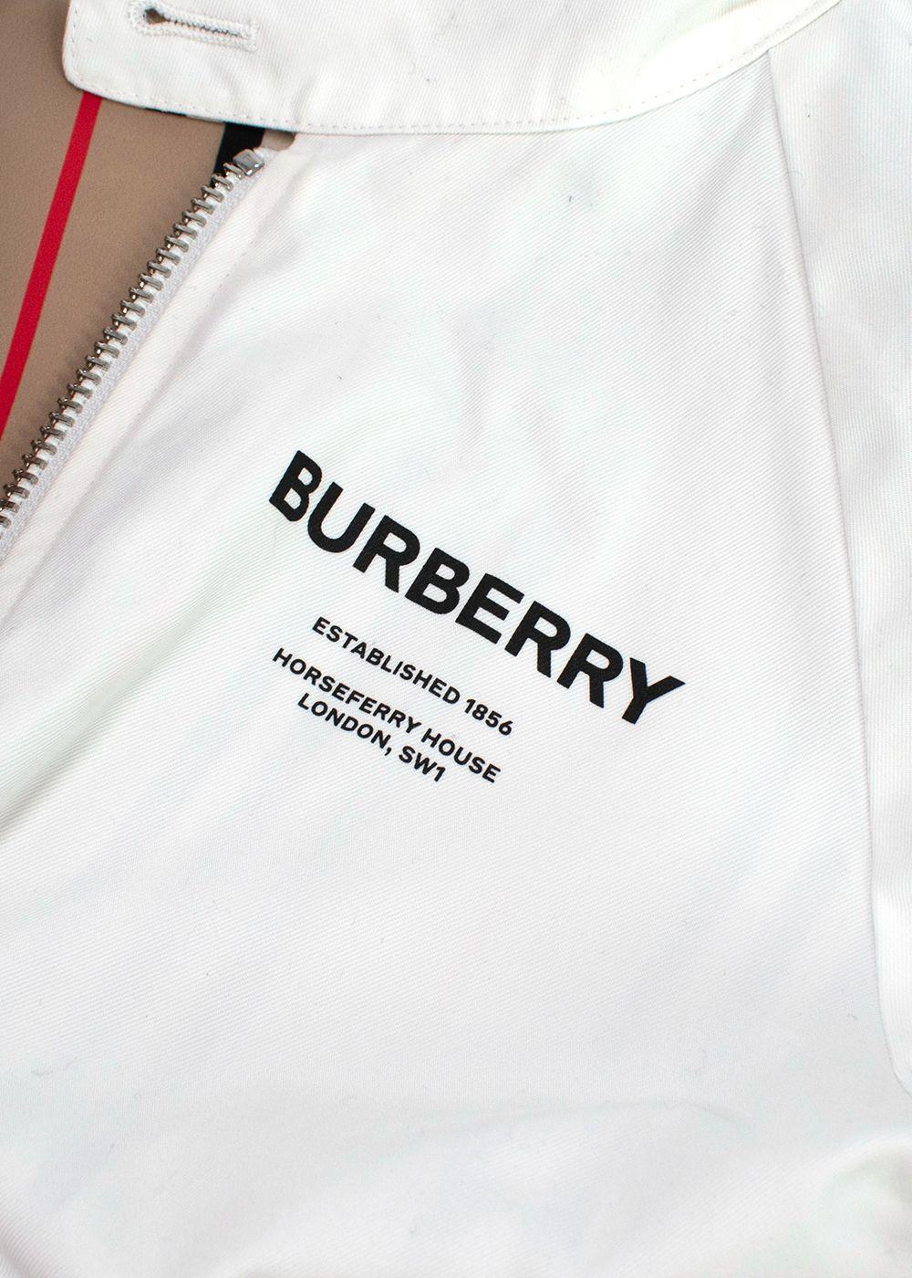 white sports coat with Burberry print