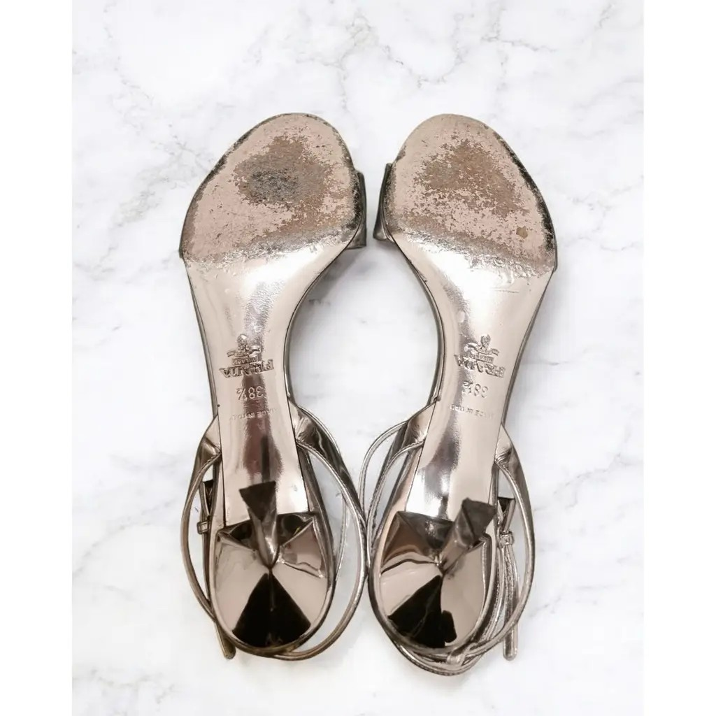 Prada Modellerie Logo-Plaque Metallic-Leather Sandals.