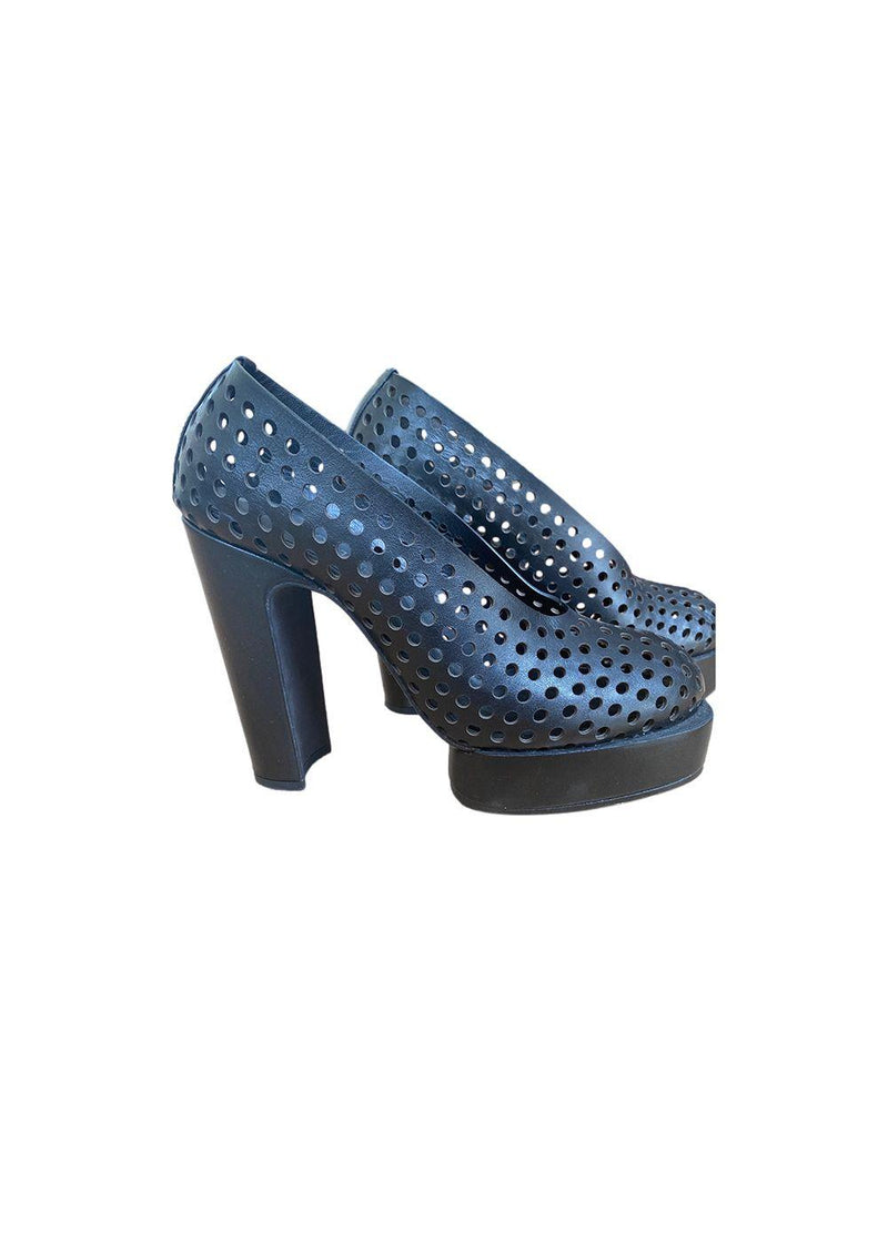Black perforated leather platform heeled pumps