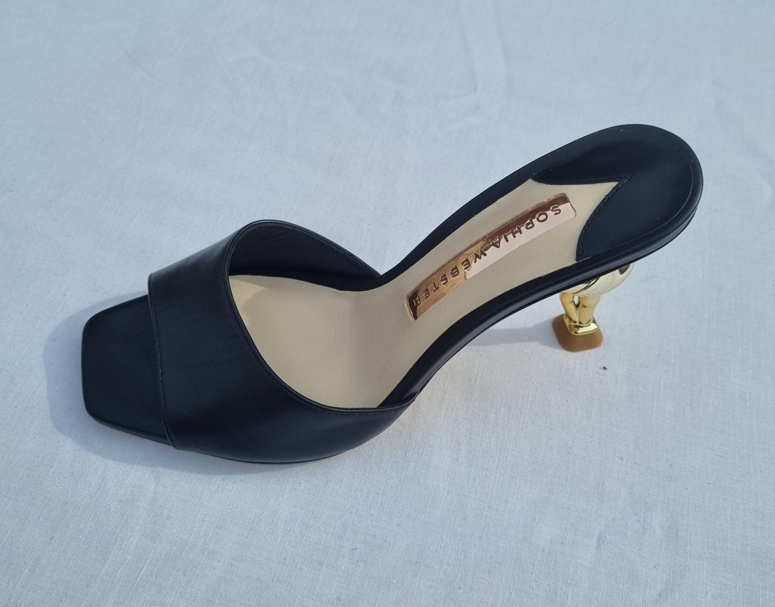 Black leather gold-tone flamingo Flo heeled mules