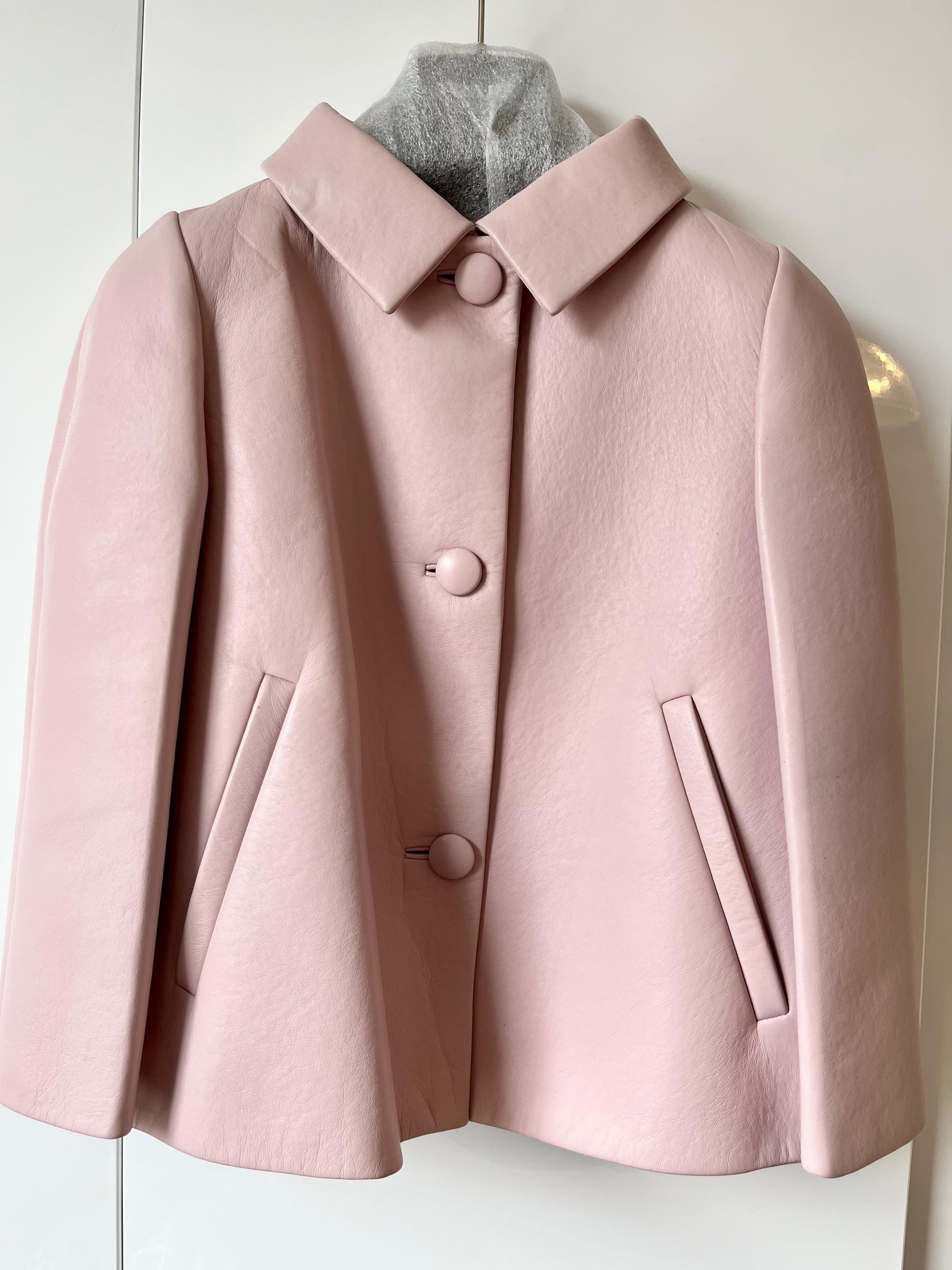 Pale pink cropped leather jacket