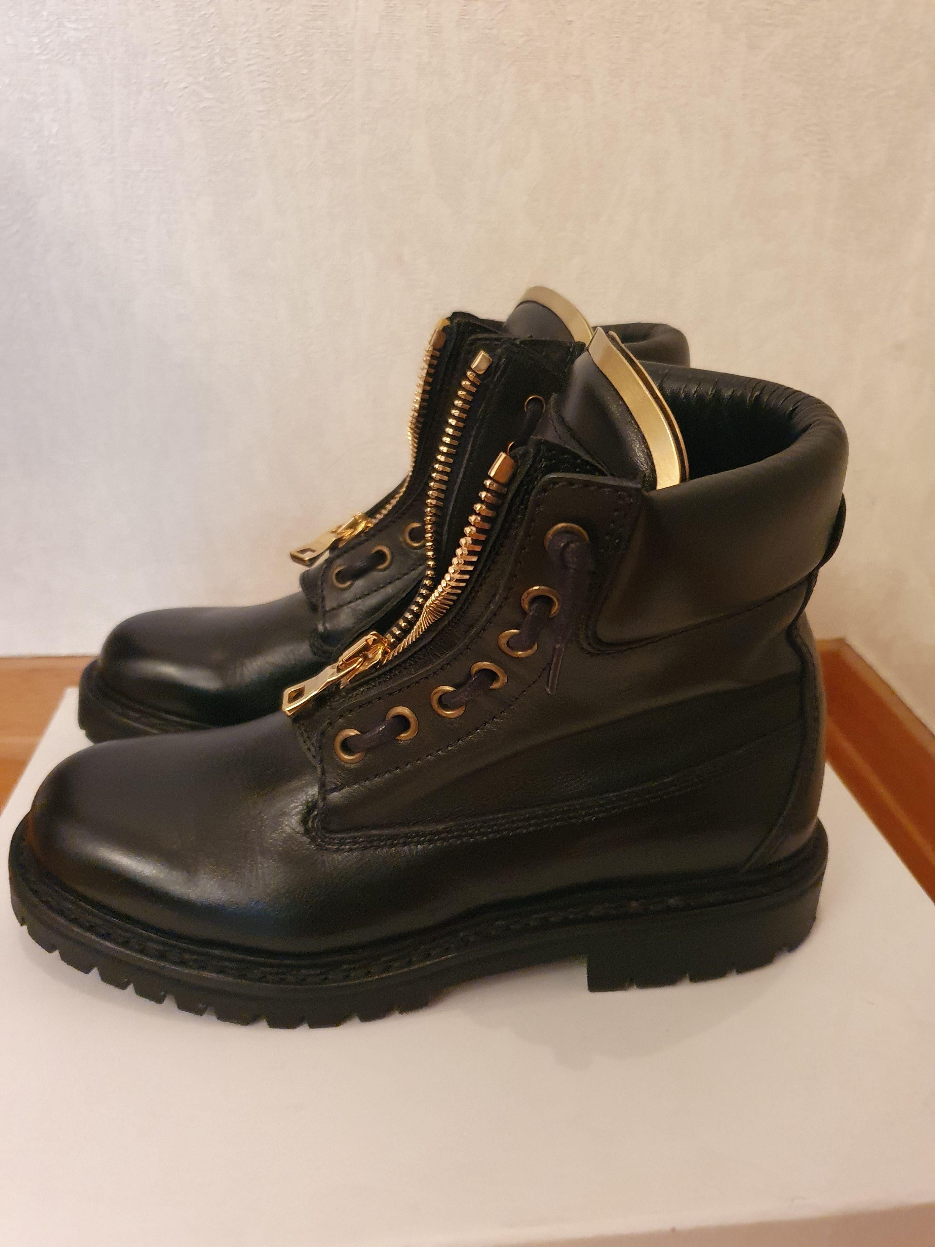 Black leather zip combat boots