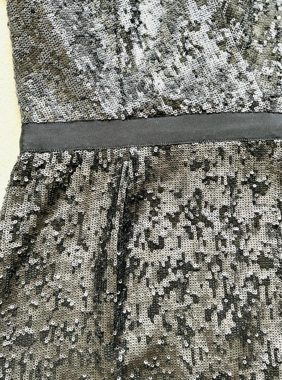 black sequinned crossover dress