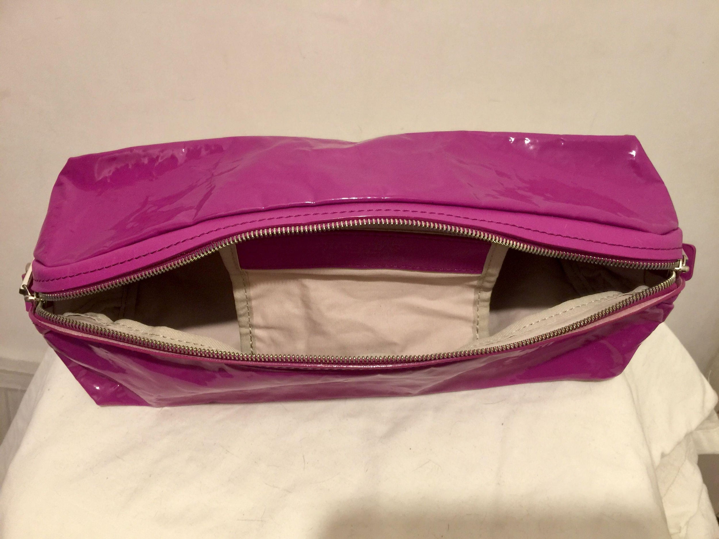 Fuchsia vinyl & leather clutch bag