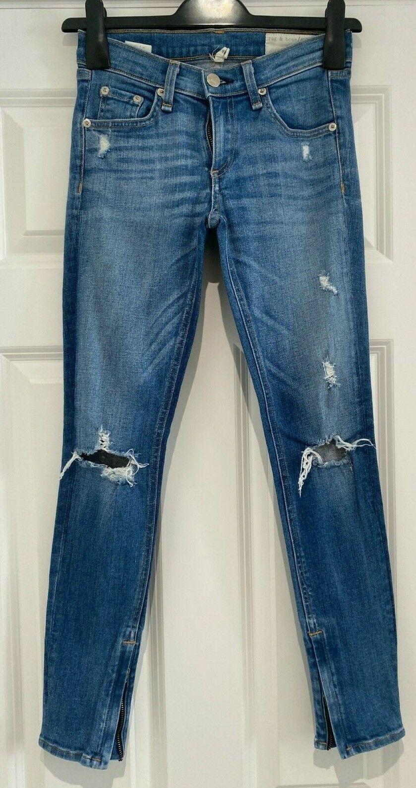 Mid-wash distressed denim Zipper Capri jeans