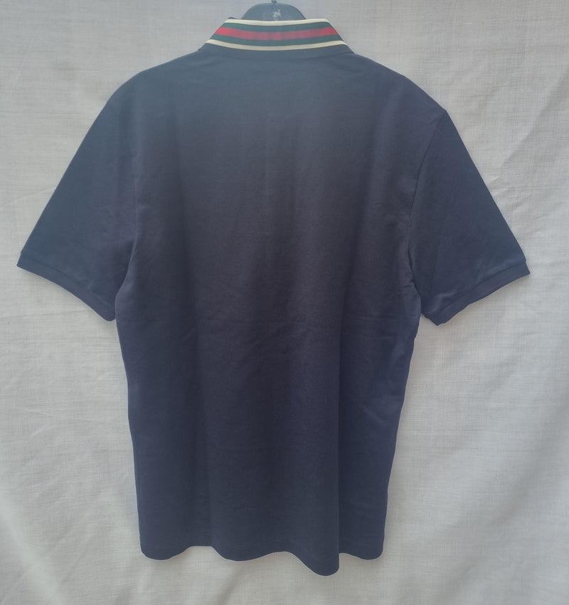 Cotton polo with Web and feline head
