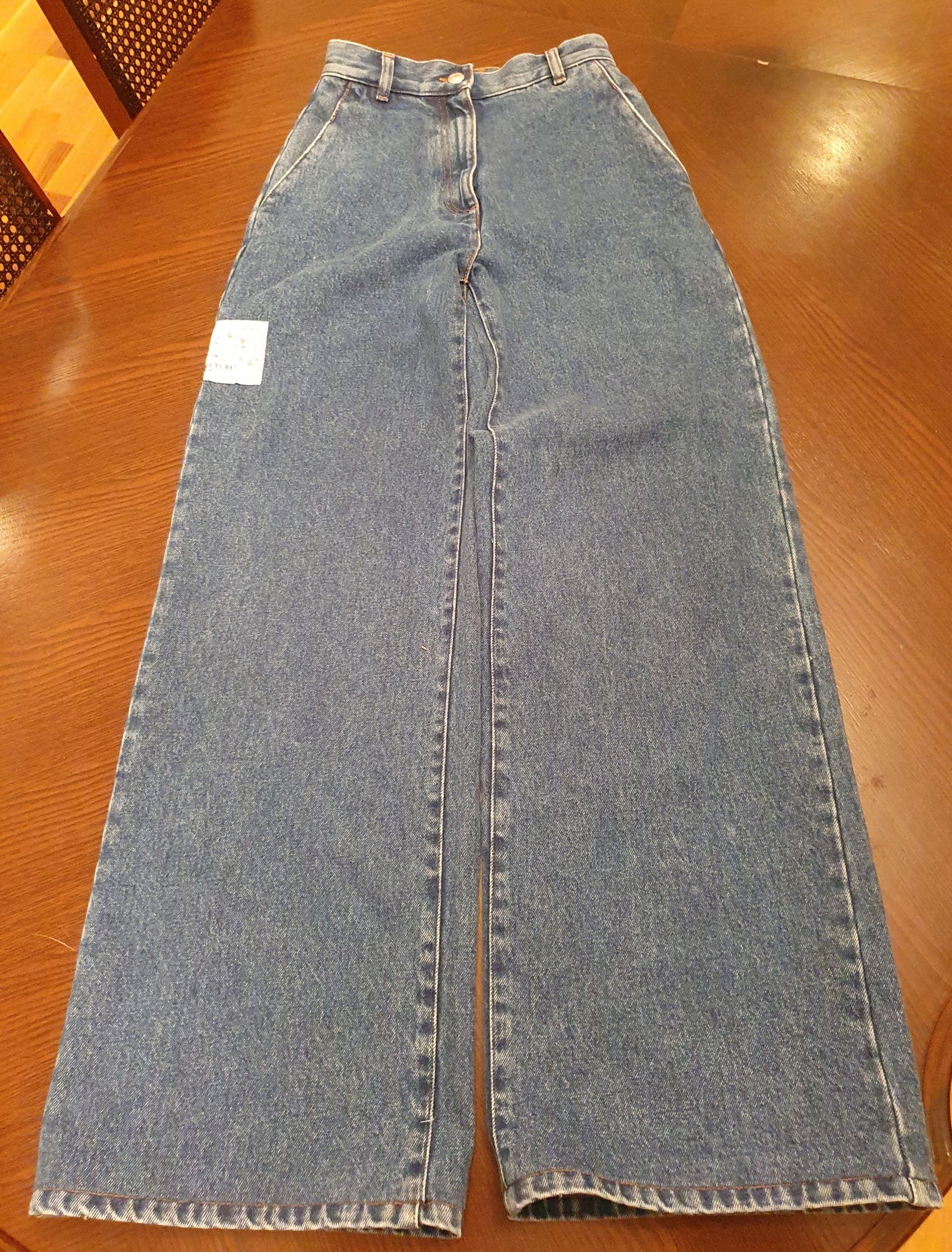 Mid-wash denim wide leg jeans