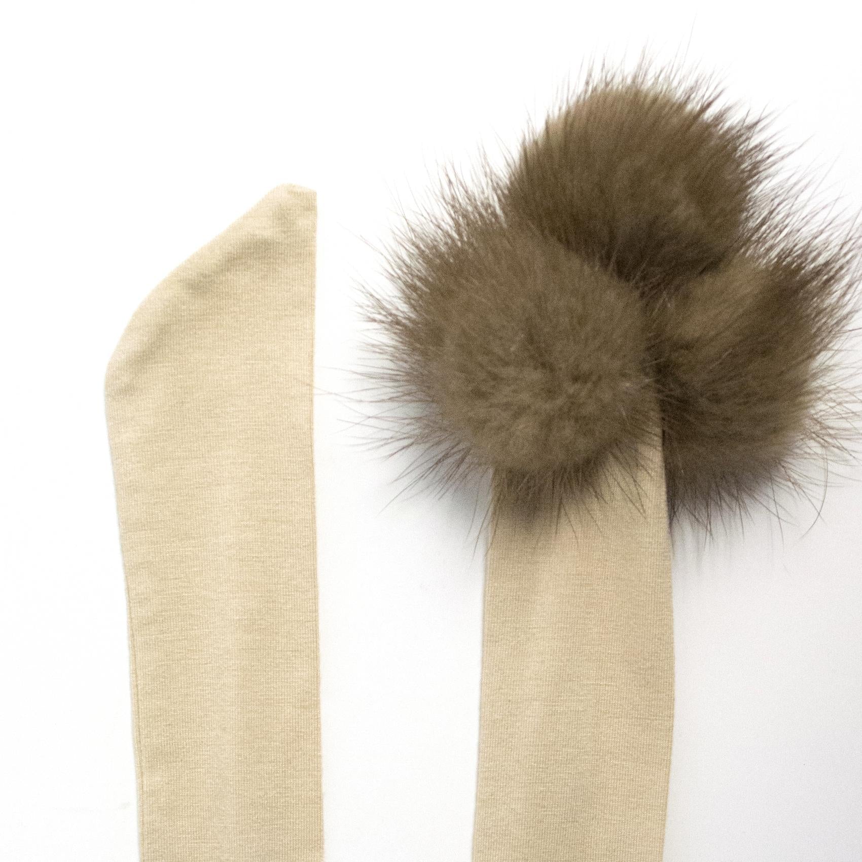 Schumacher beige top with fox fur