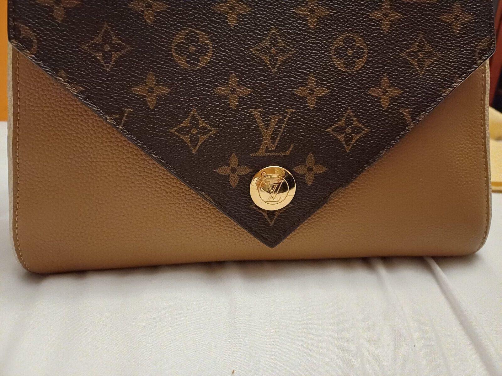 Louis Vuitton Sesame Monogram Canvas and Leather Double V Bag