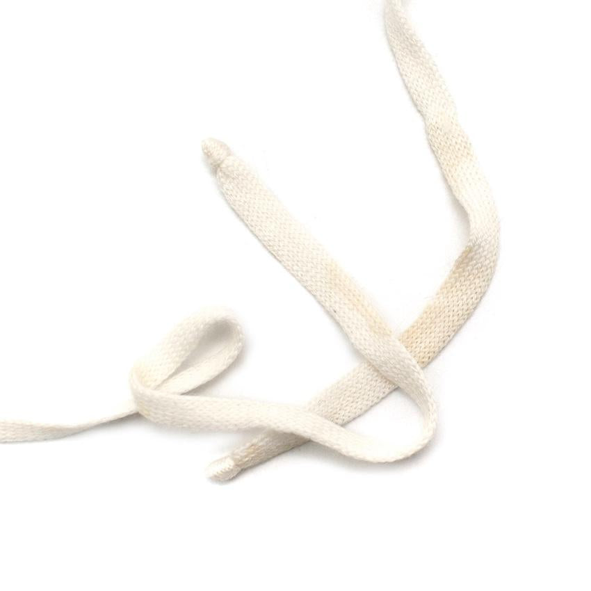 White Wool Knit Beanie with a Pom Pom and Bows