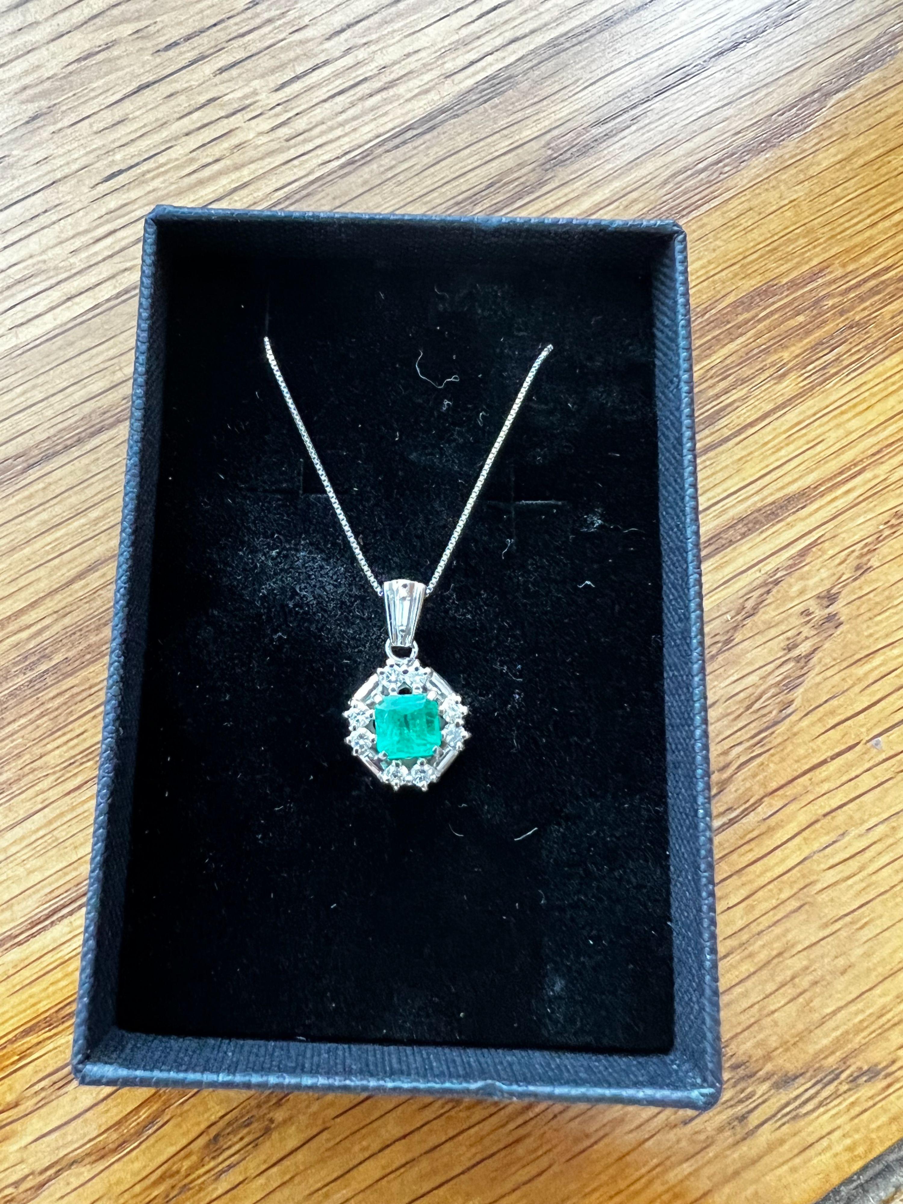 Platinum, emerald & diamond pendant necklace