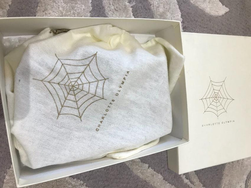 Charlotte Olympia Visage Clutch