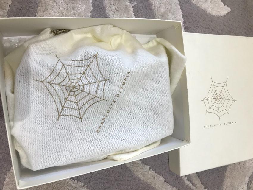 Charlotte Olympia Visage Clutch