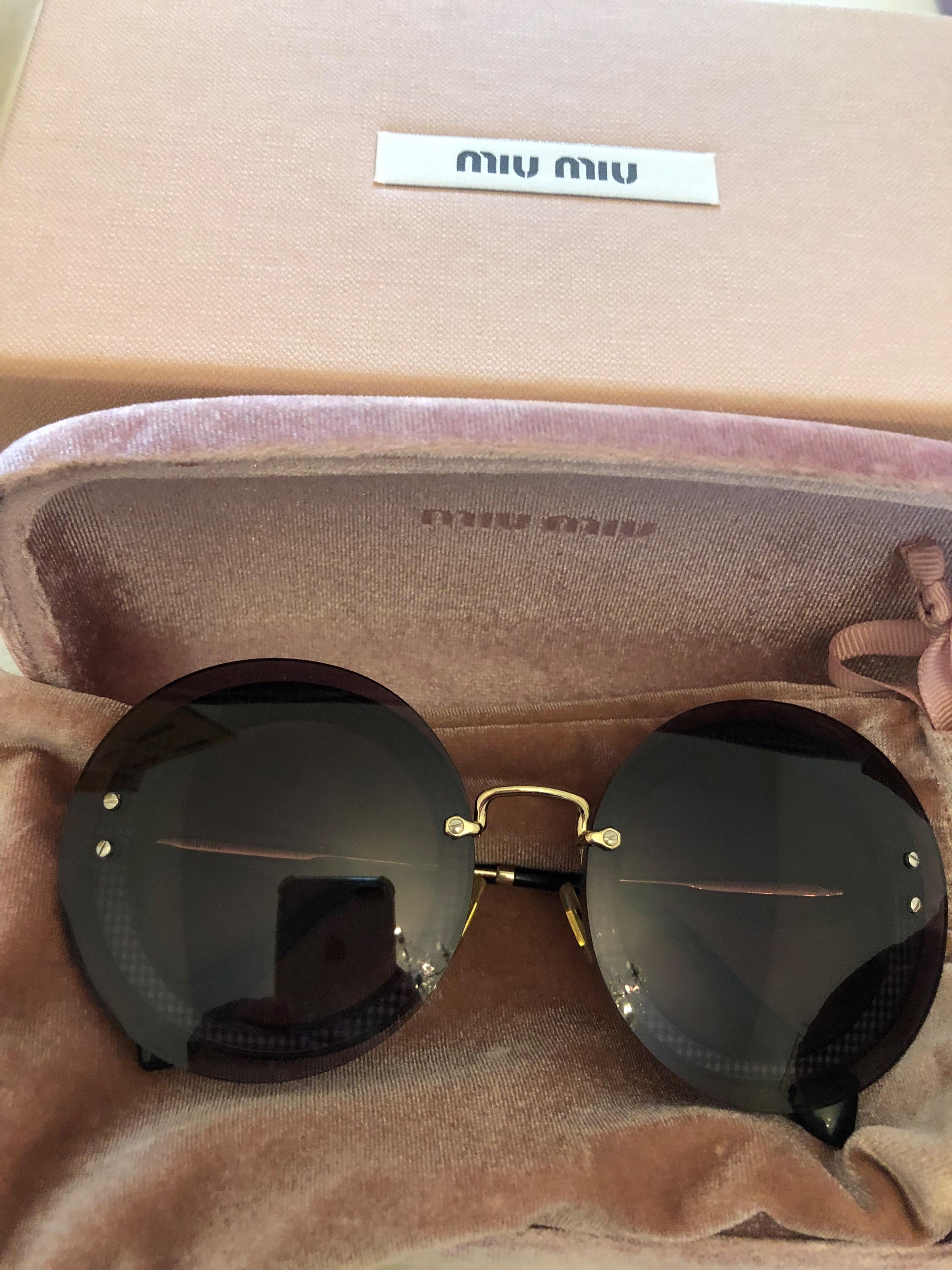 Miu Miu Black Round Sunglasses