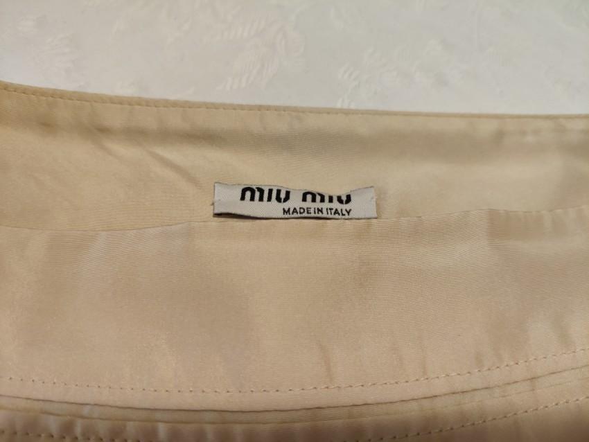 Miu Miu beige pleated mini skirt