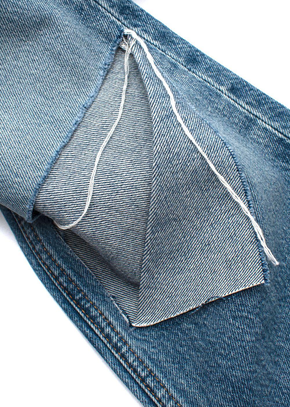 raw hem blue jeans