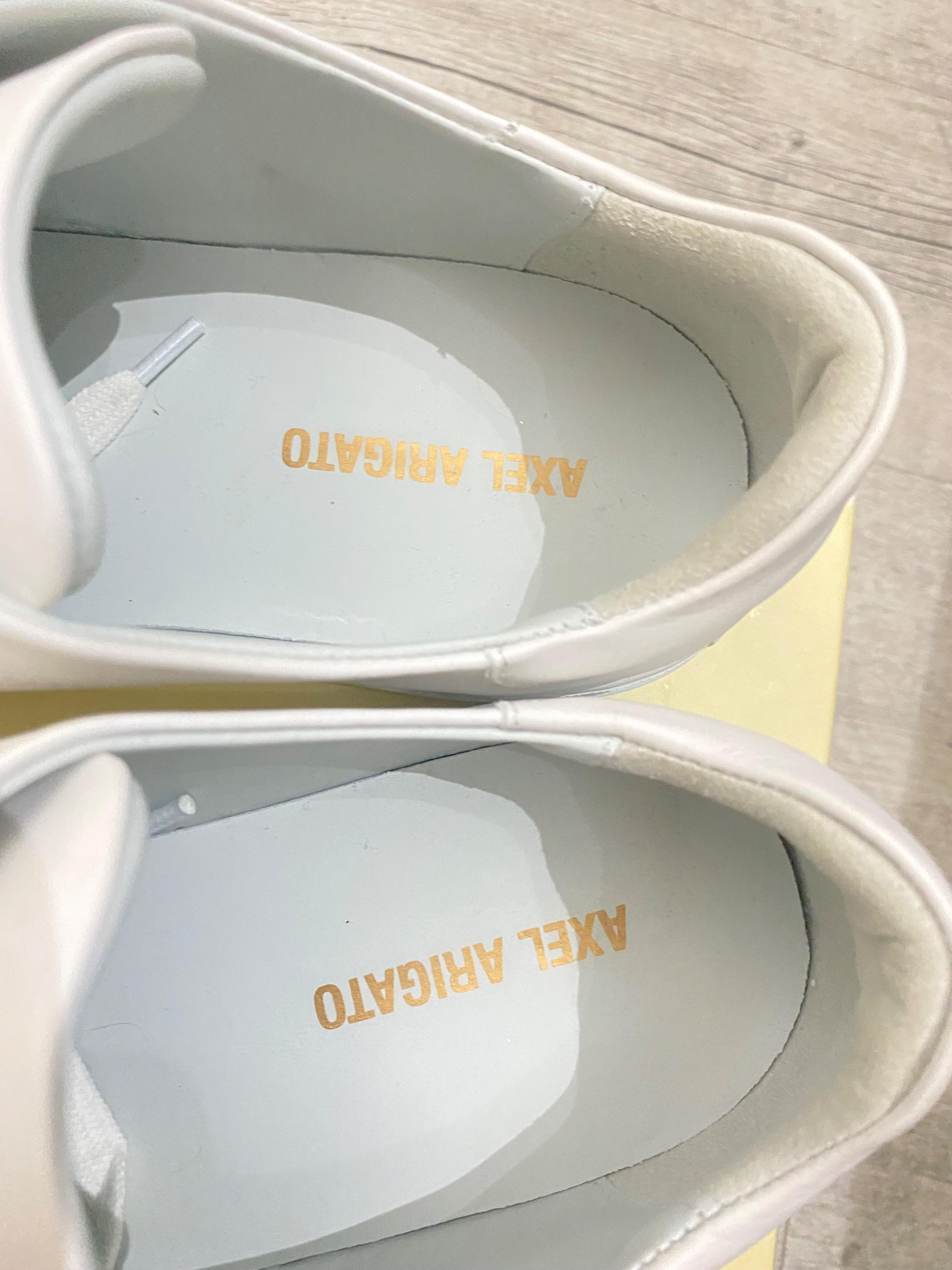 white leather low top trainers