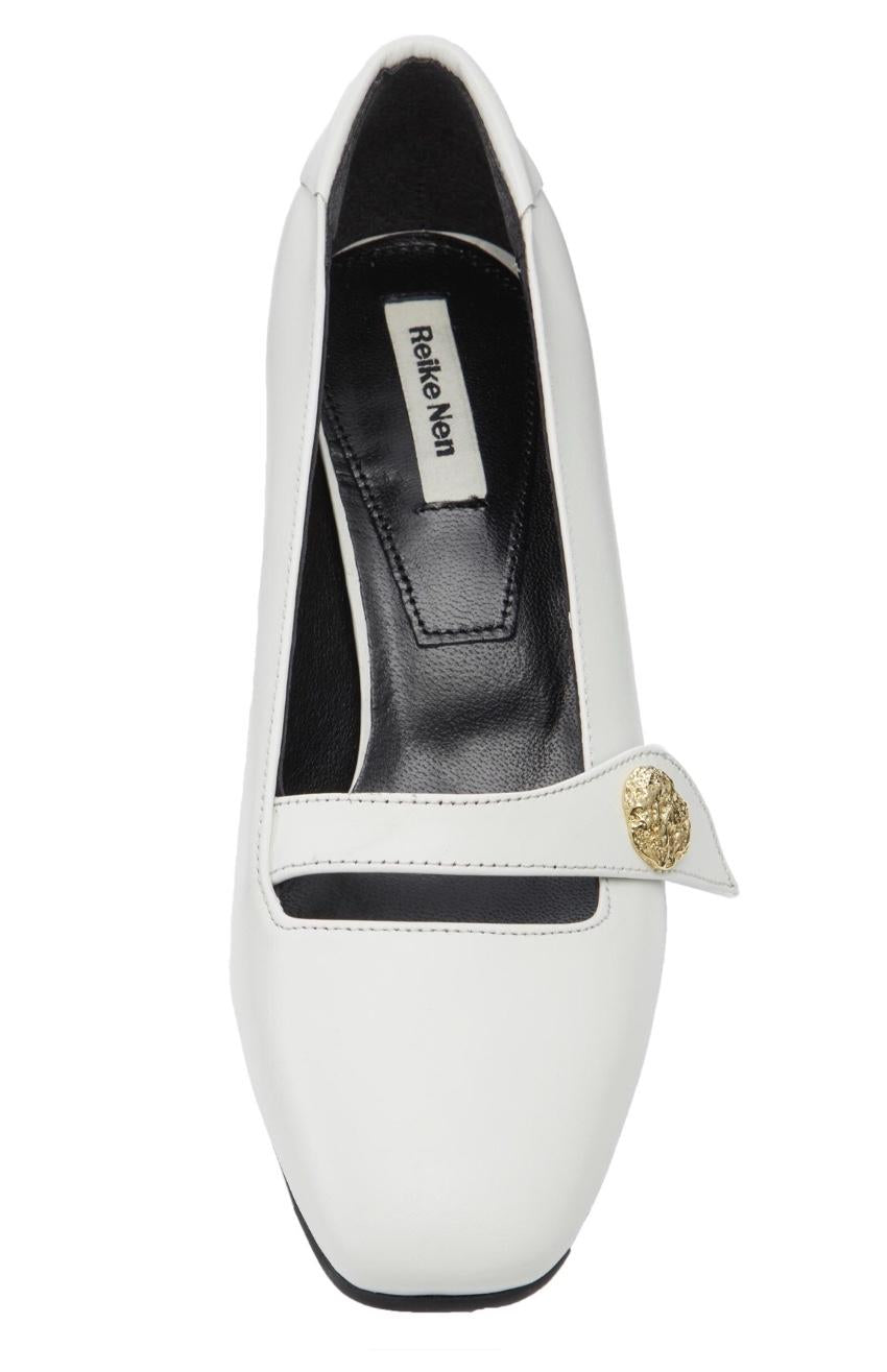 Reike Nen white leather pumps
