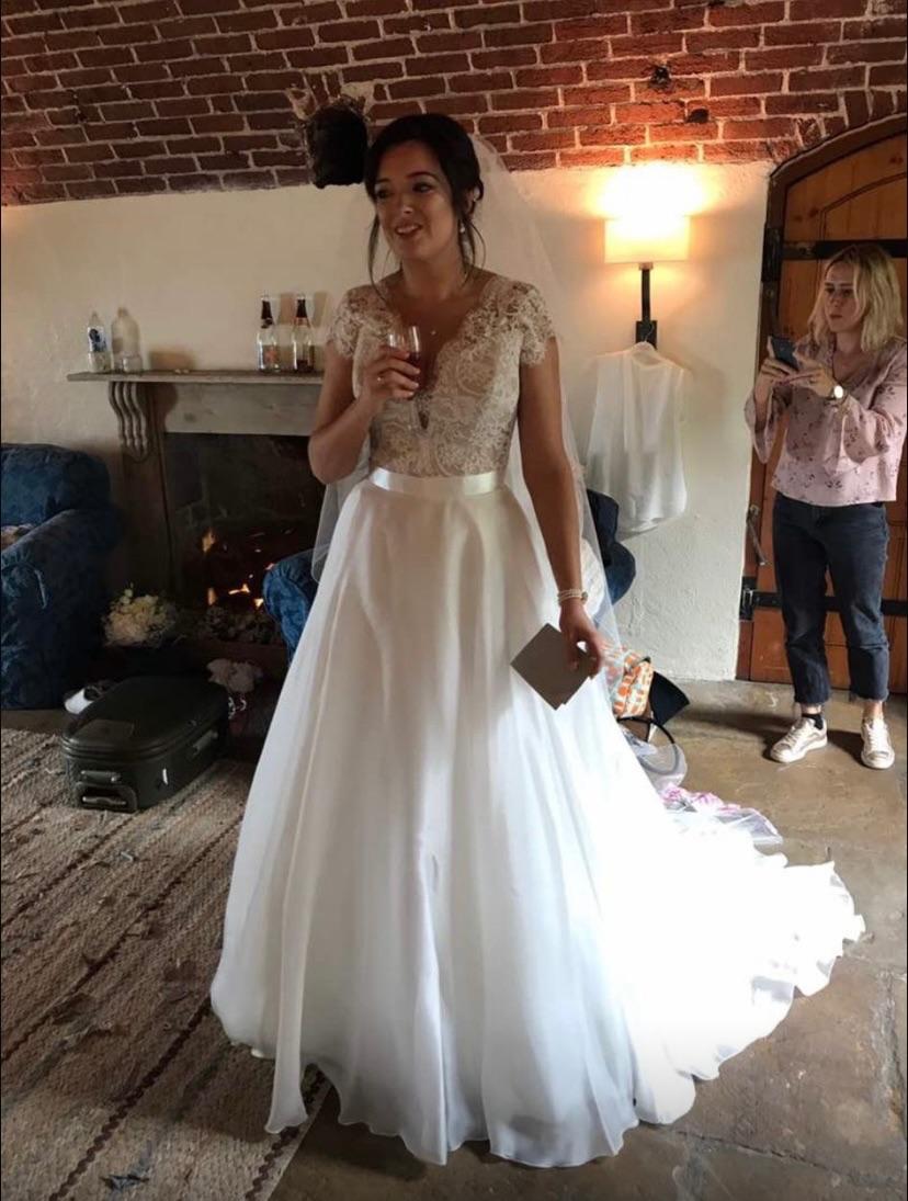 White Lace Body Bridal Gown With Full Skirt And Train