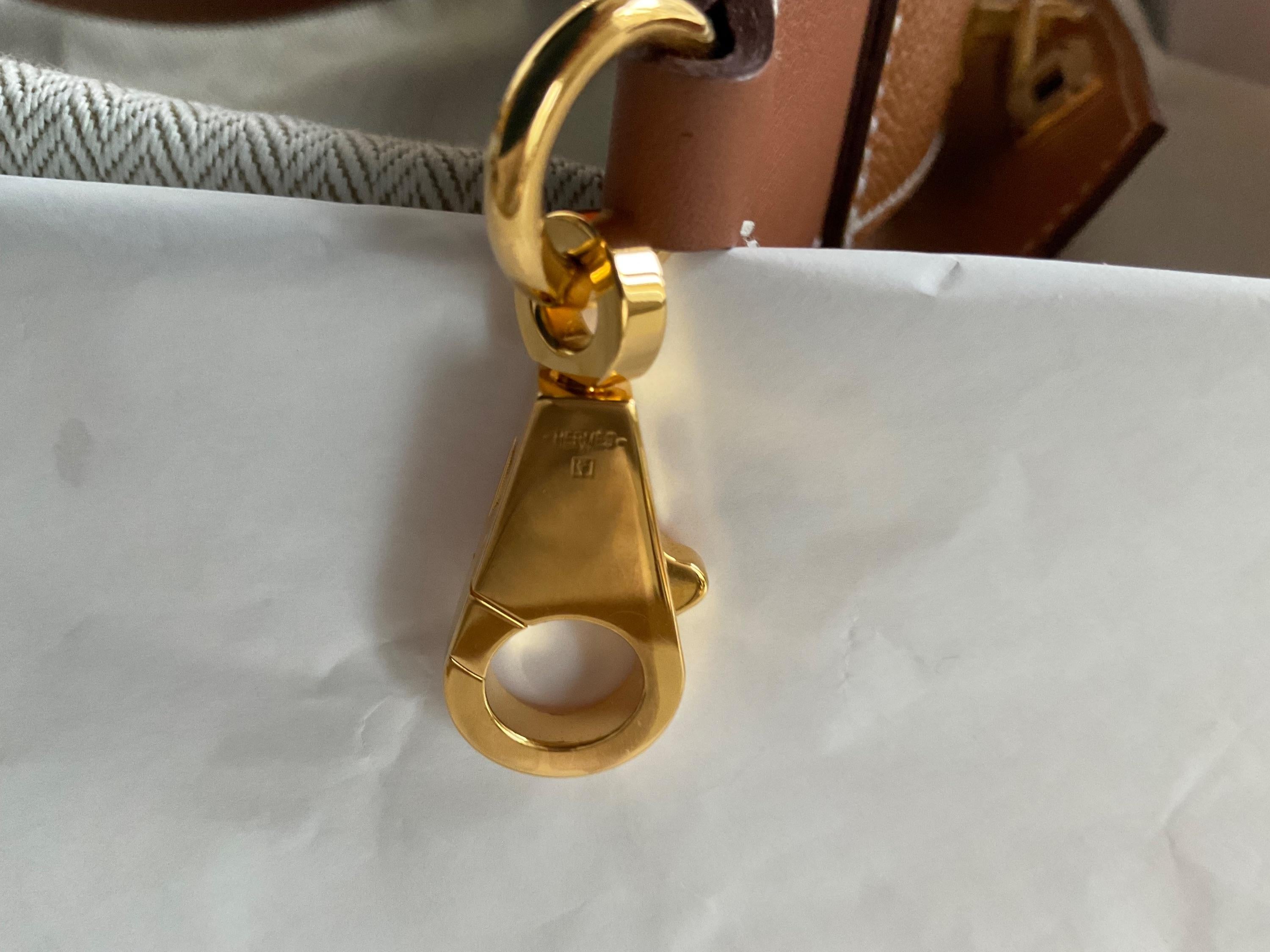 Hermes Gold Kelly Pocket Strap with Gold Hardware