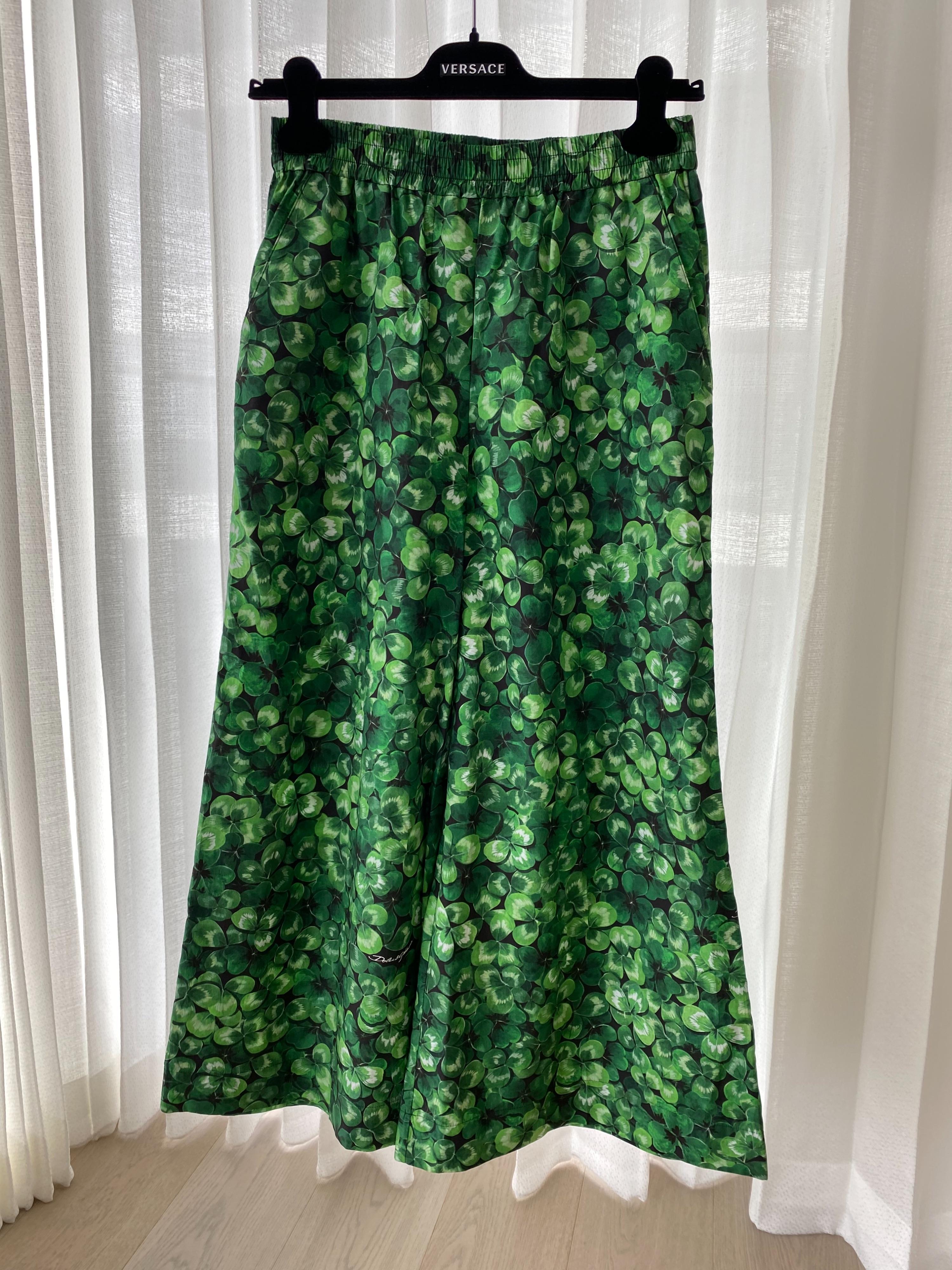 Green clover print cotton trousers