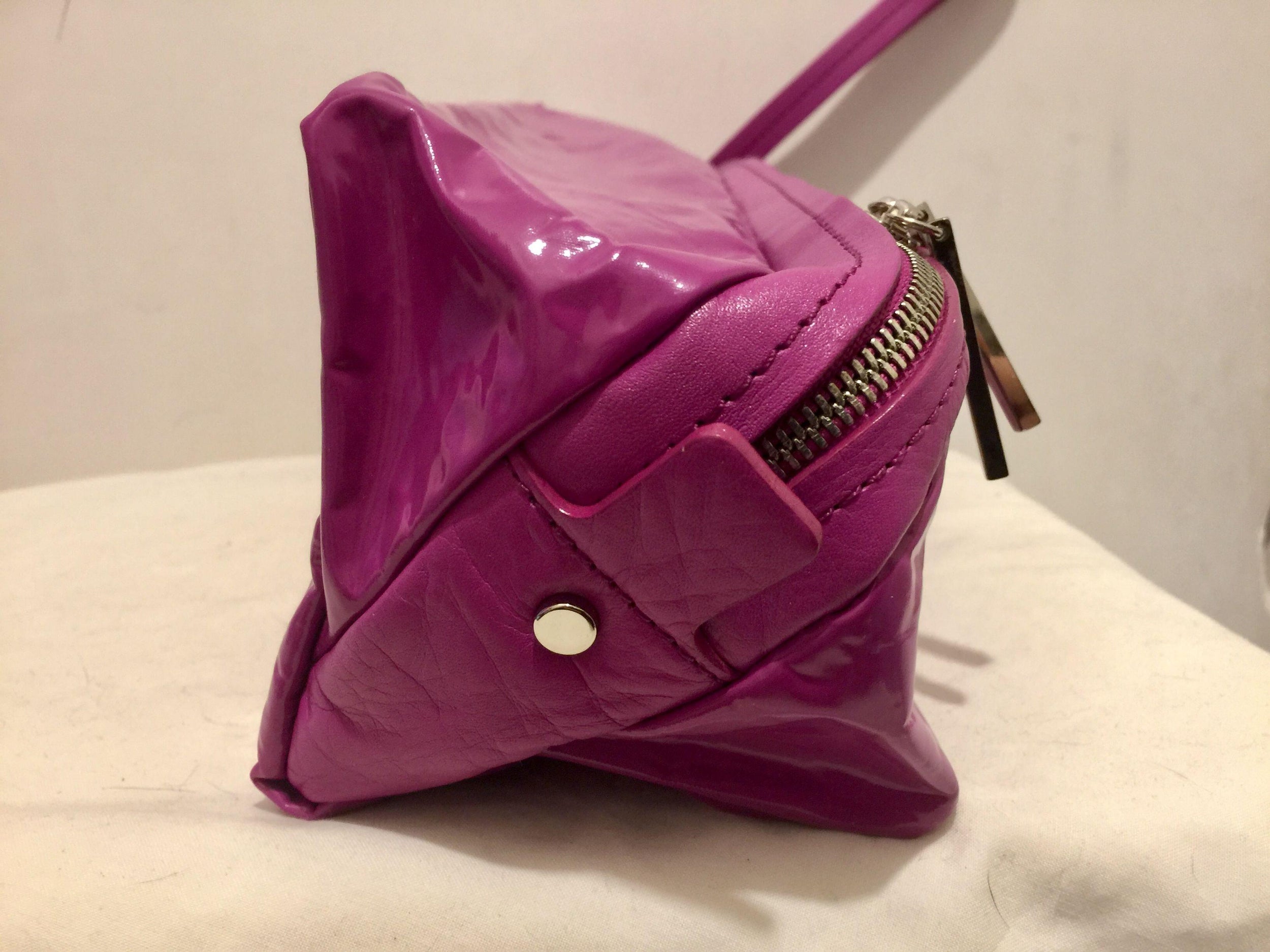 Fuchsia vinyl & leather clutch bag