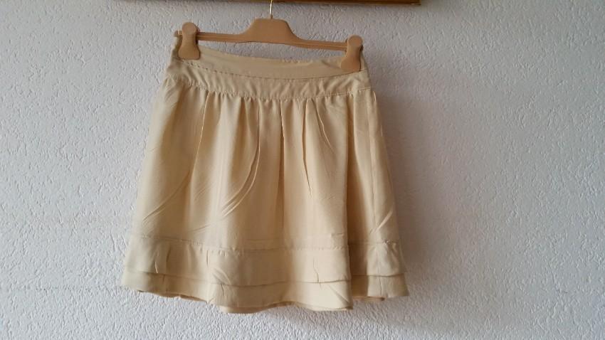 Miu Miu beige pleated mini skirt