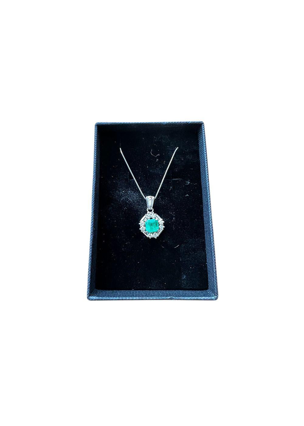 Platinum, emerald & diamond pendant necklace